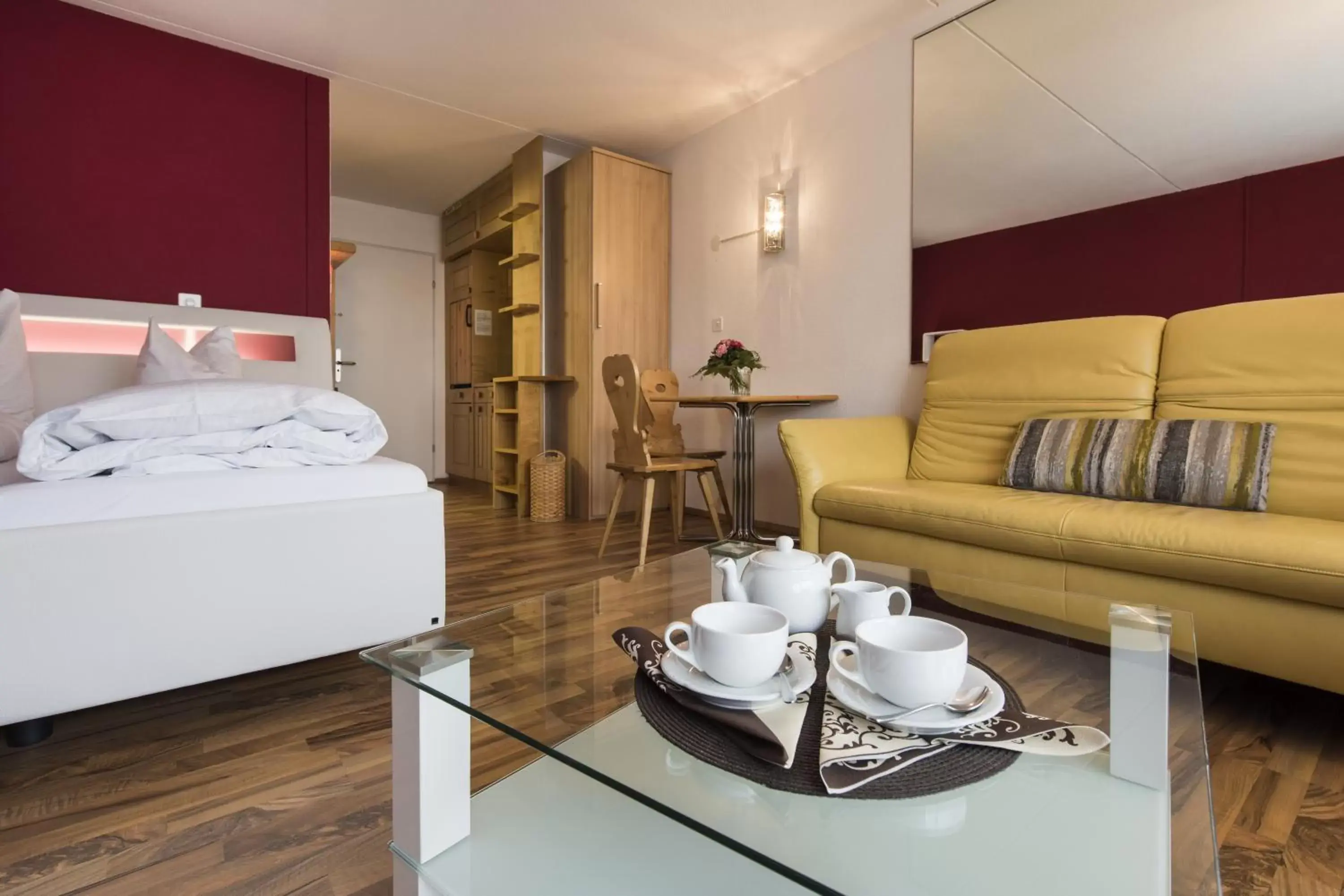 Bedroom in Hotel des Alpes