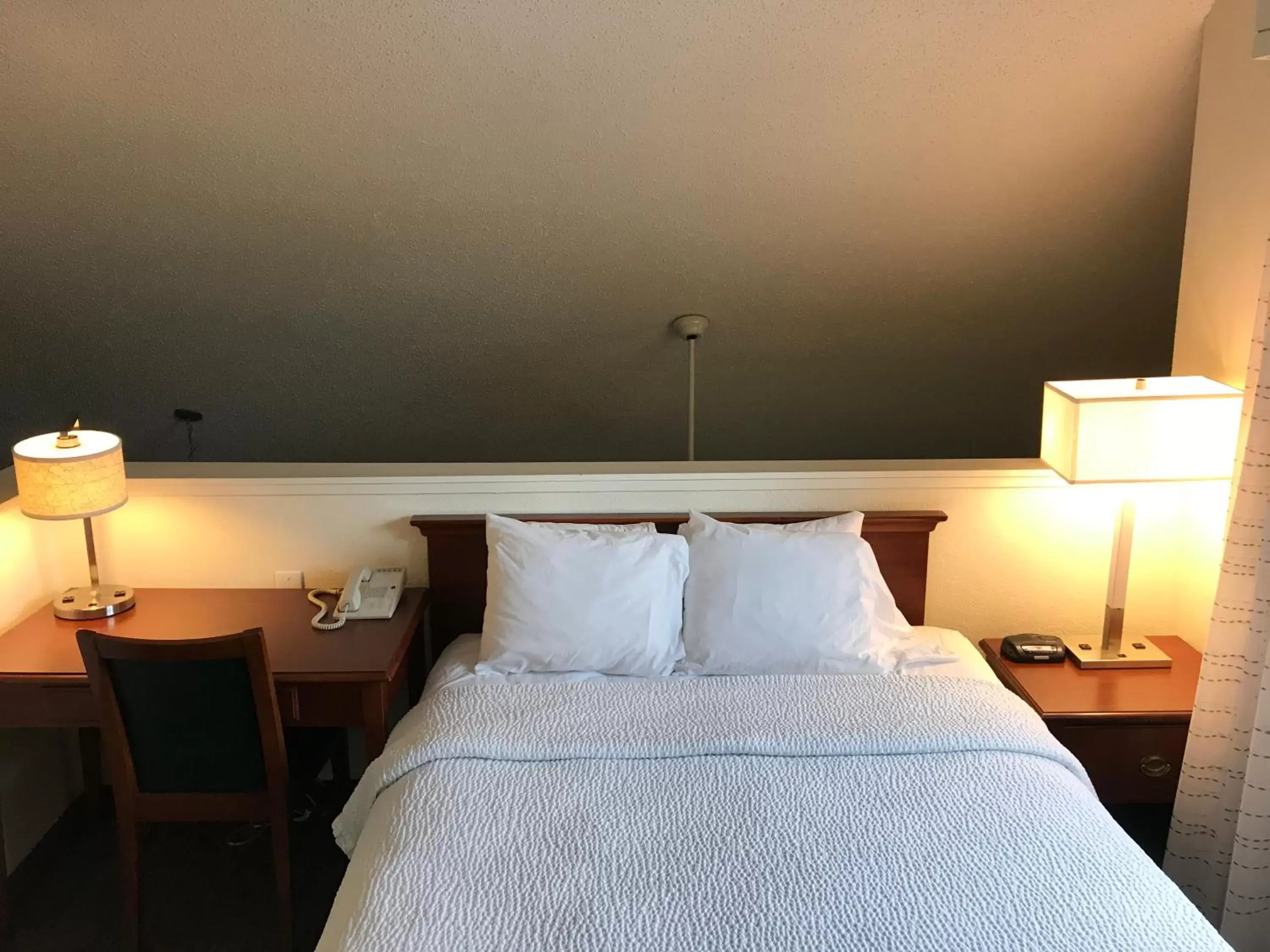 Bed in Hawthorn Suites by Wyndham Tinton Falls