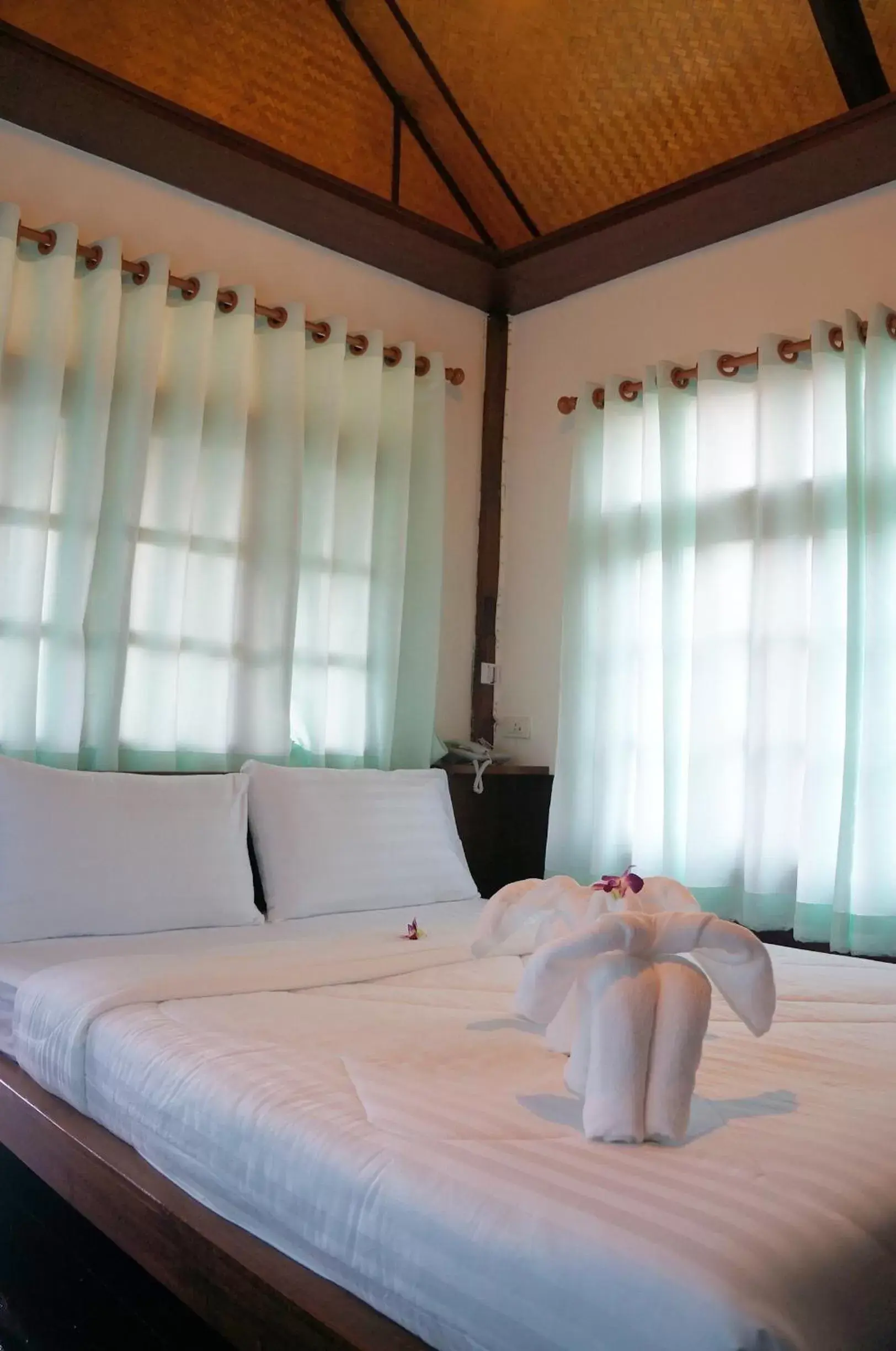 Bed in Chanpraya Resort