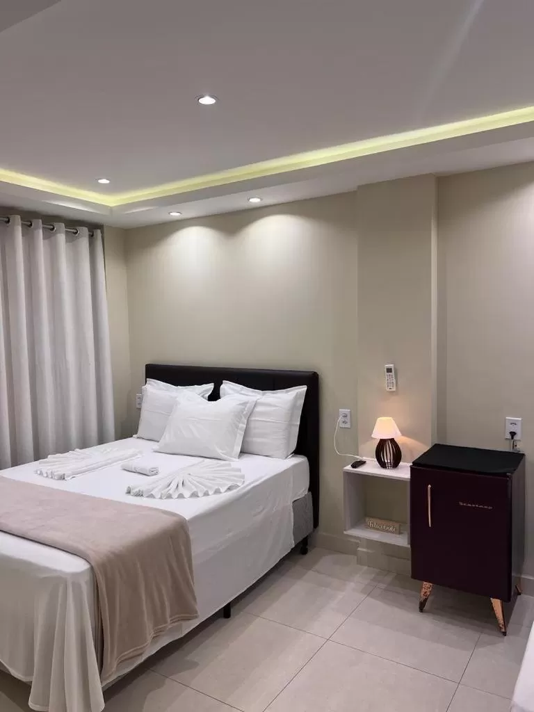 Bed in Pousada Arraial Tropical