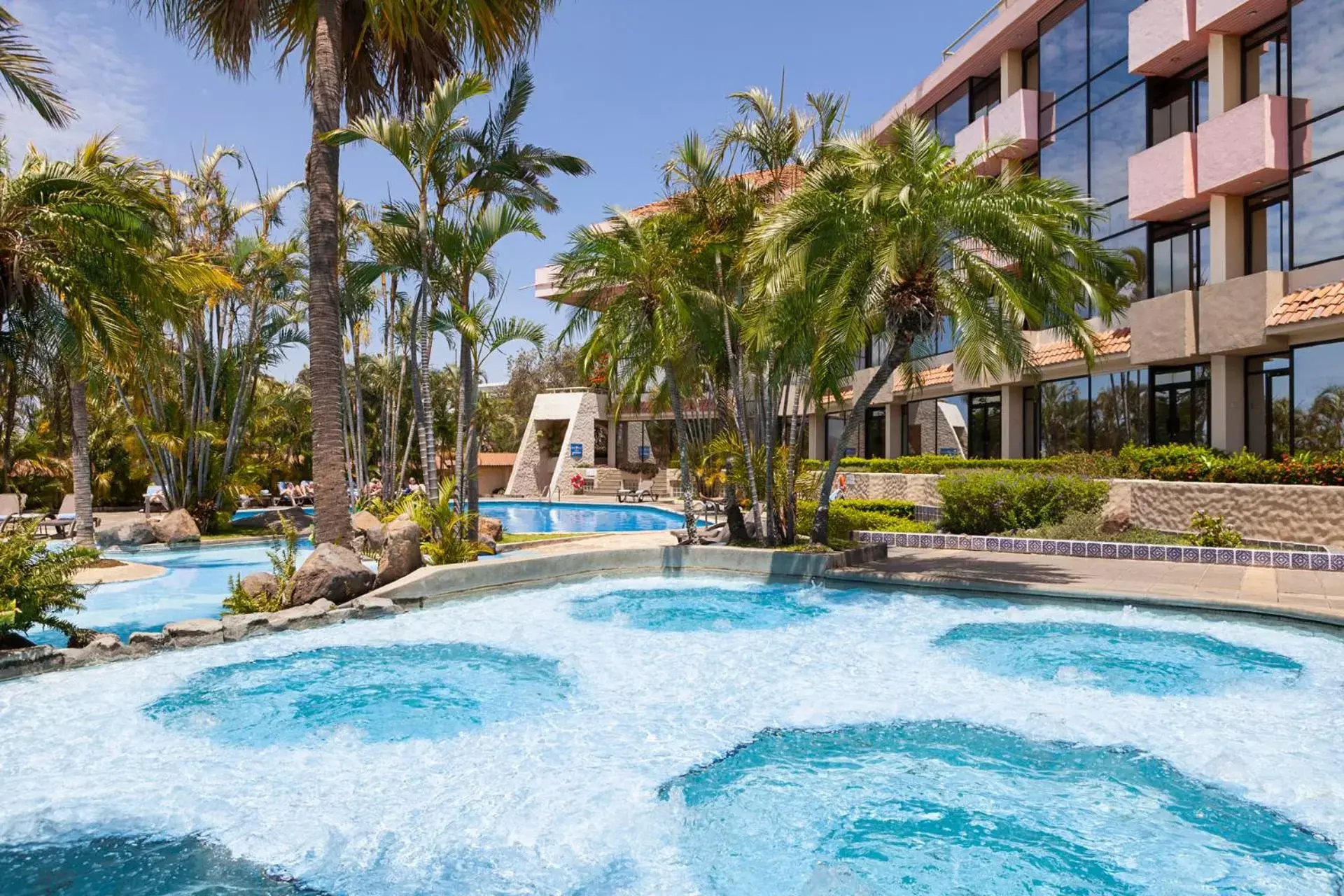 Solarium, Swimming Pool in Wyndham San Jose Herradura