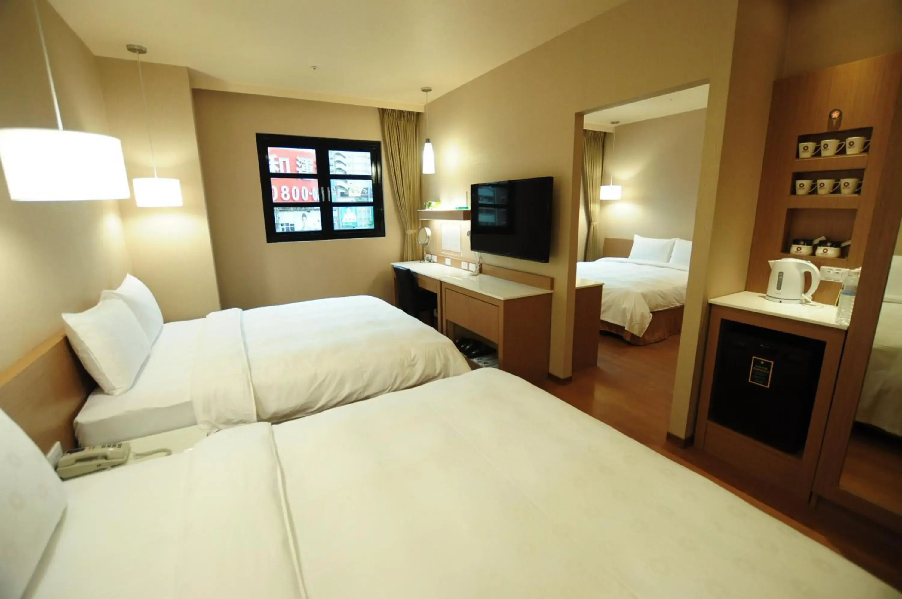 Photo of the whole room, Bed in Kindness Hotel - Kaohsiung Main Station