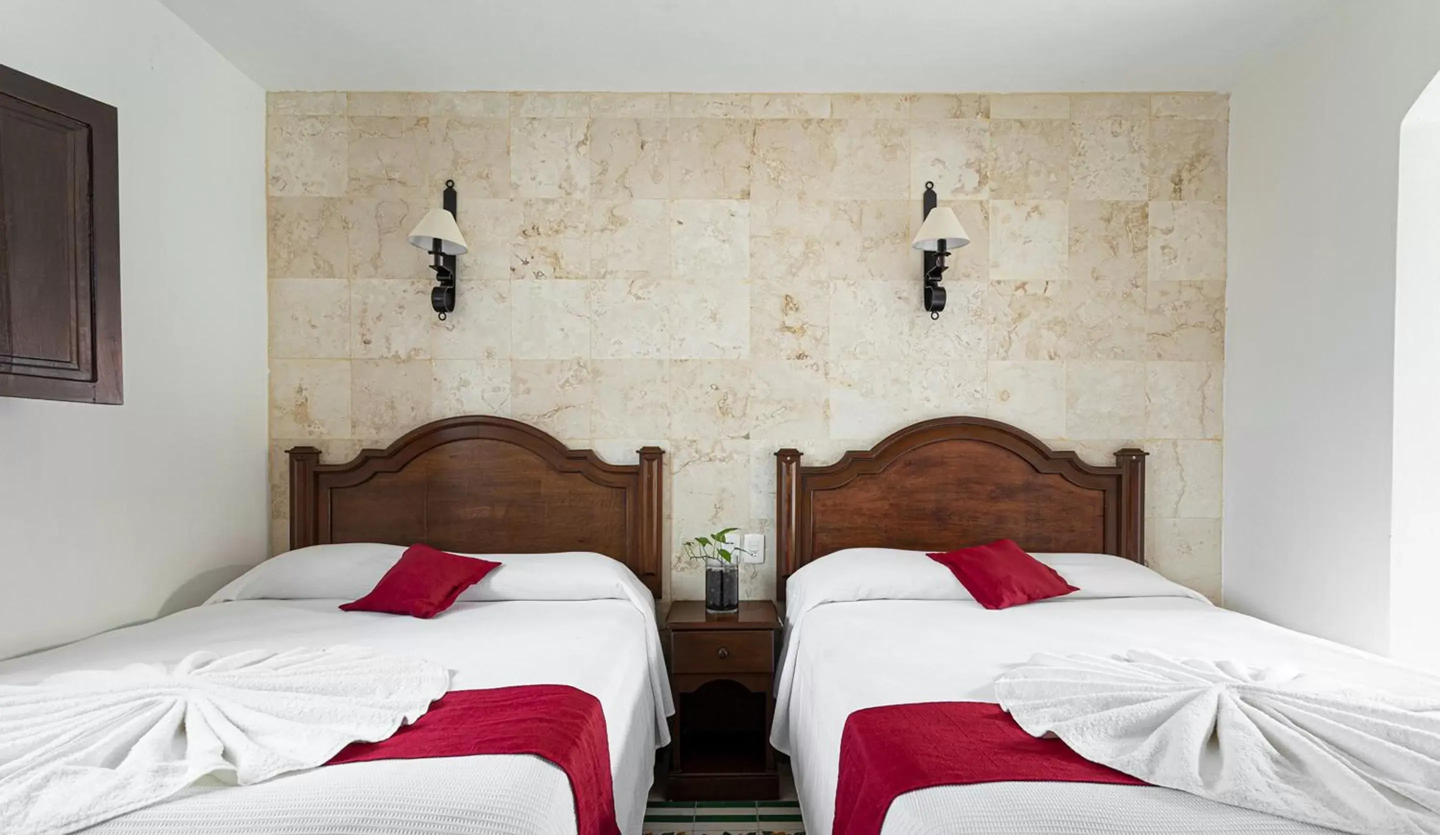 Bed in La Aurora Hotel Colonial
