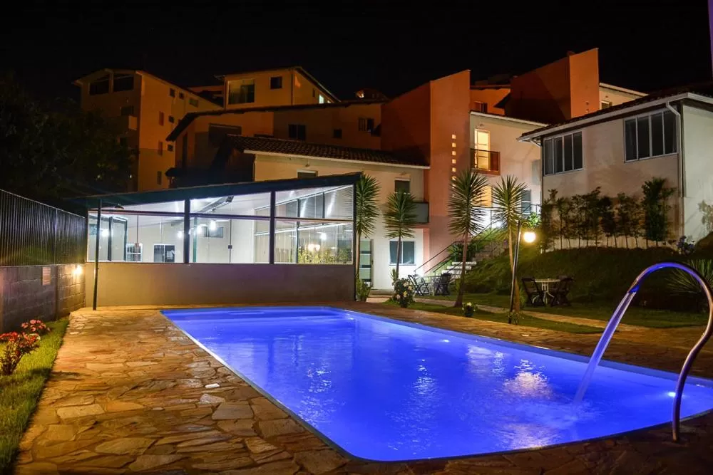 Swimming Pool in Pousada Vila Real Flats