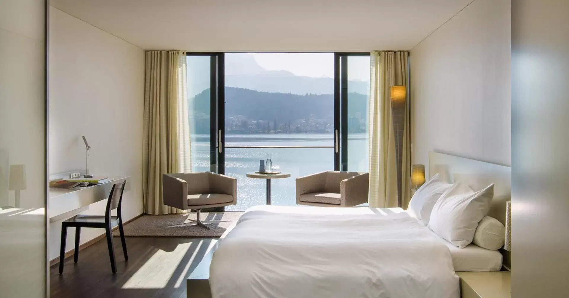 Photo of the whole room in HERMITAGE Lake Lucerne - Beach Club & Lifestyle Hotel