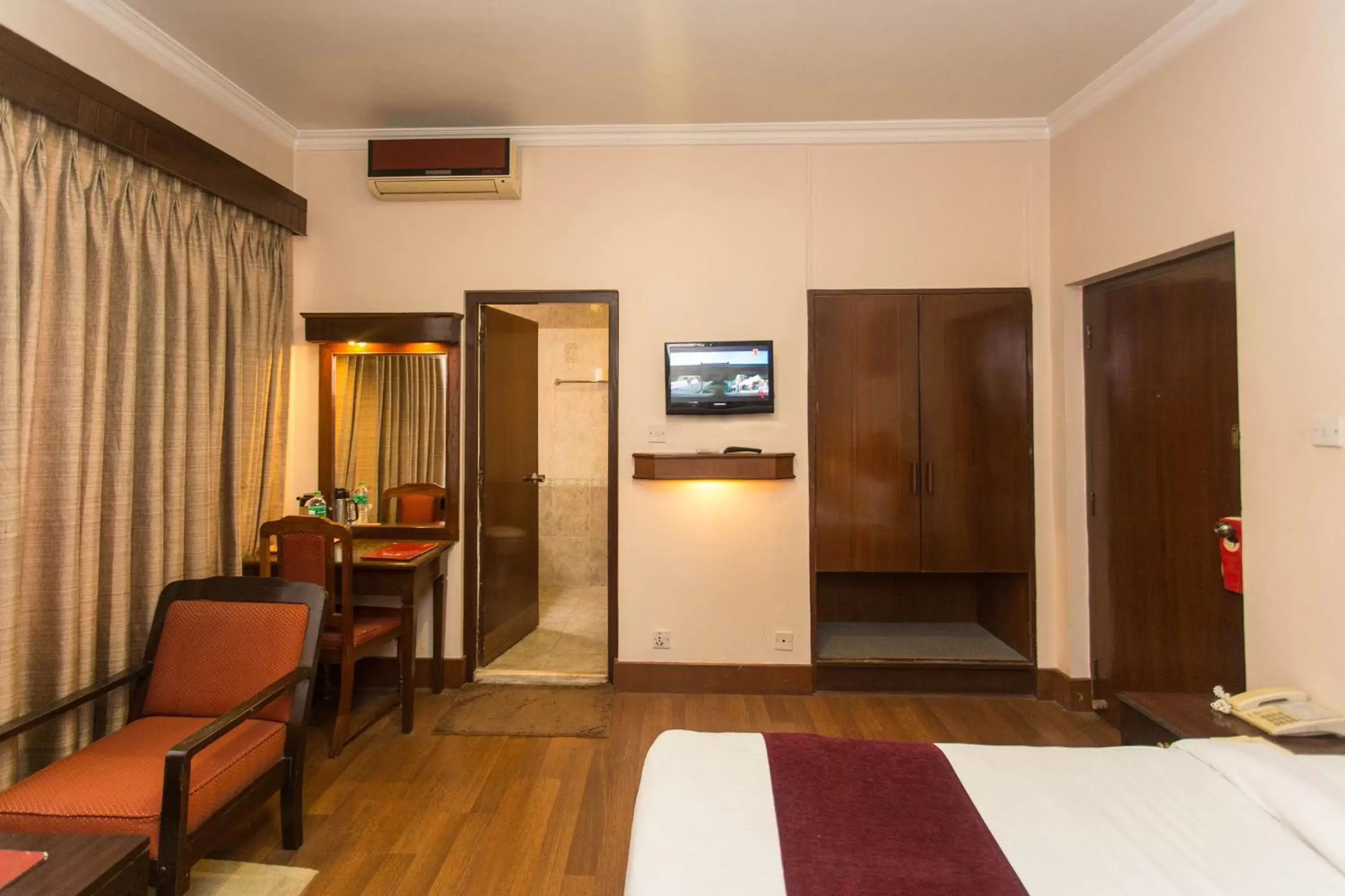 Bedroom, TV/Entertainment Center in Hotel Marshyangdi