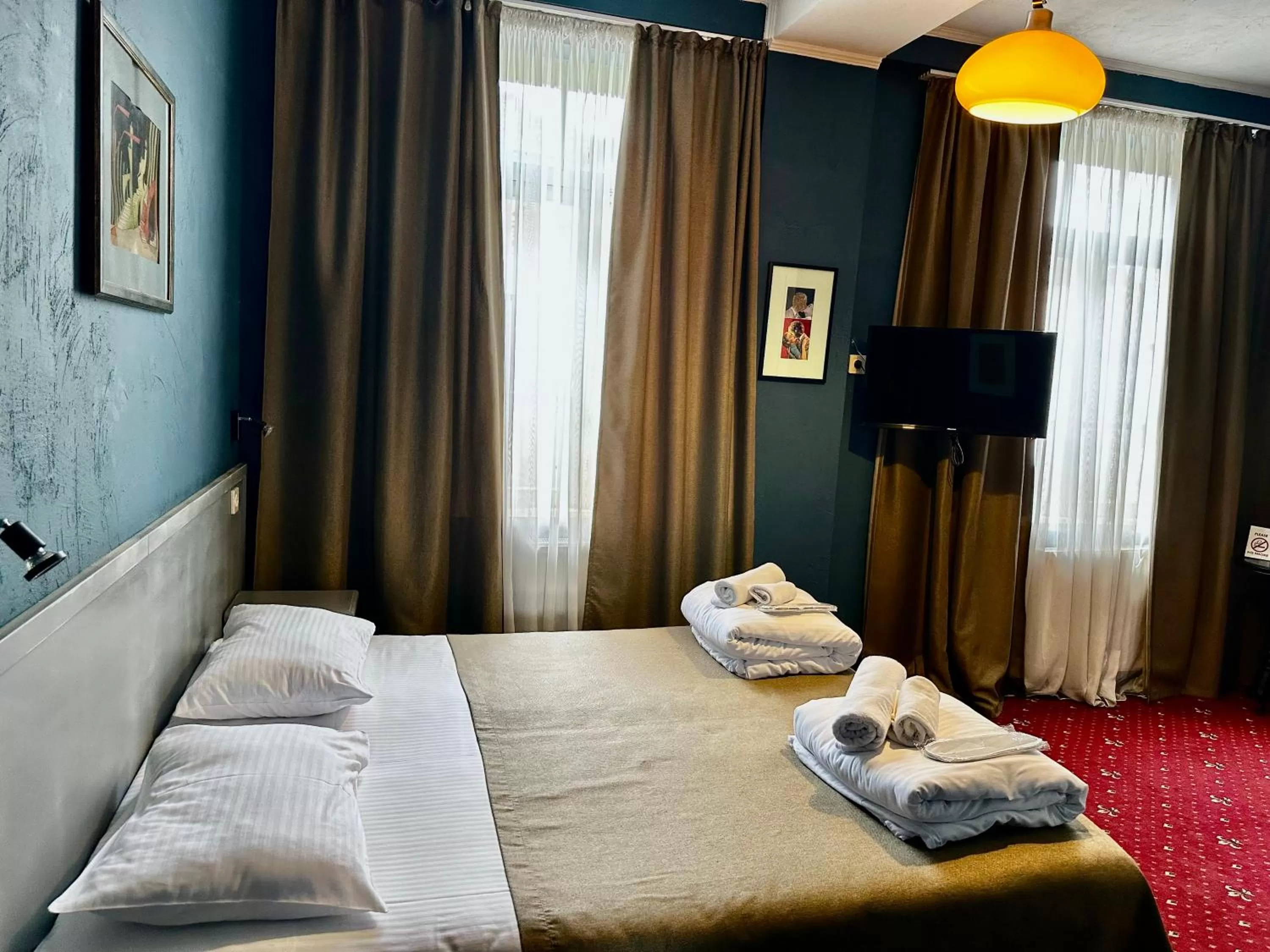 Bed in Kindli Boutique Hotel