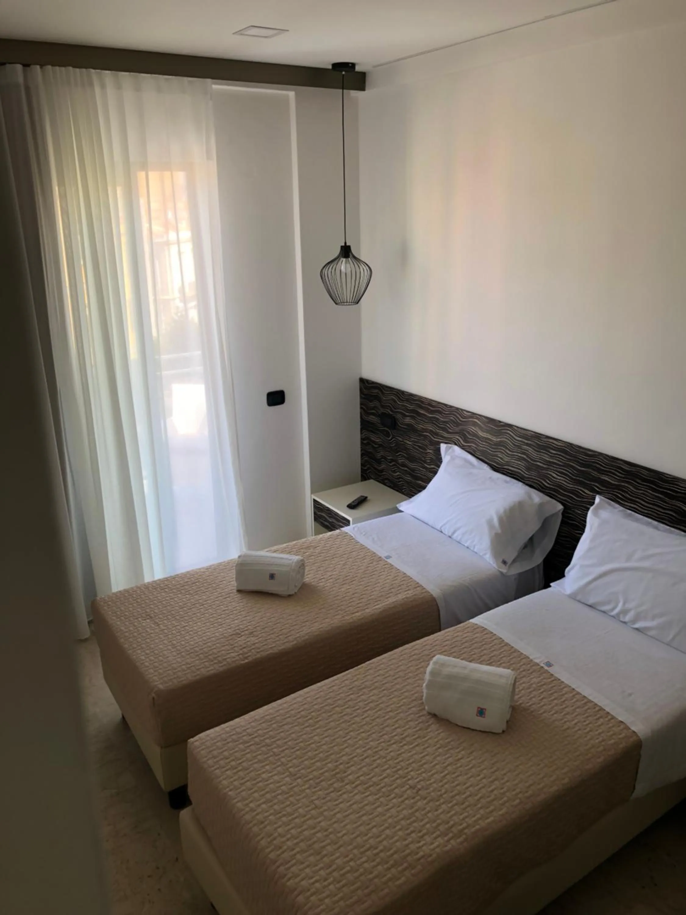 Bed in Albergo Milazzo Inn AiMori