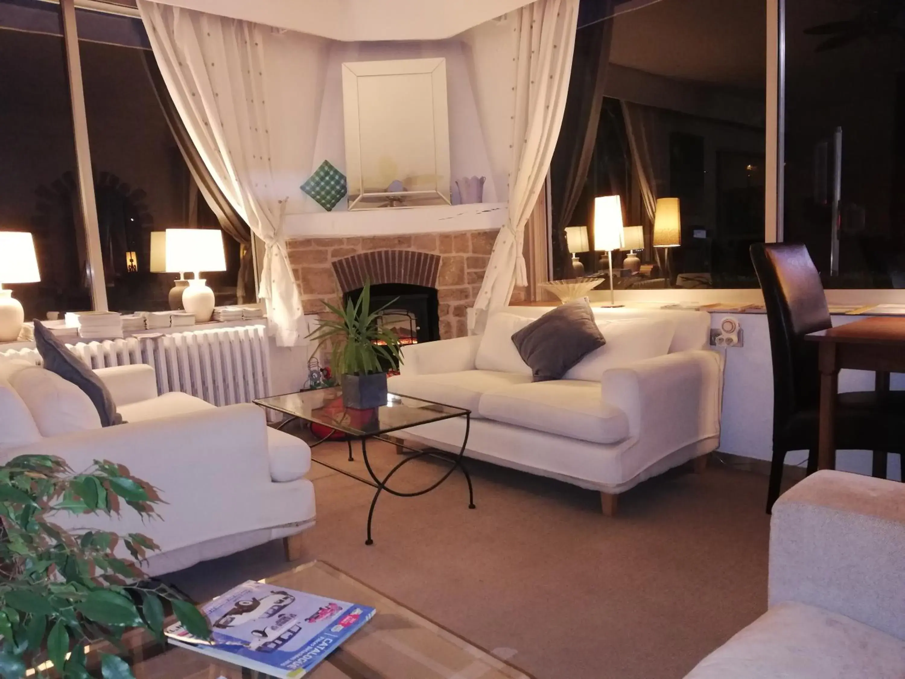 Property building, Seating Area in Logis Hotel des Cayrons