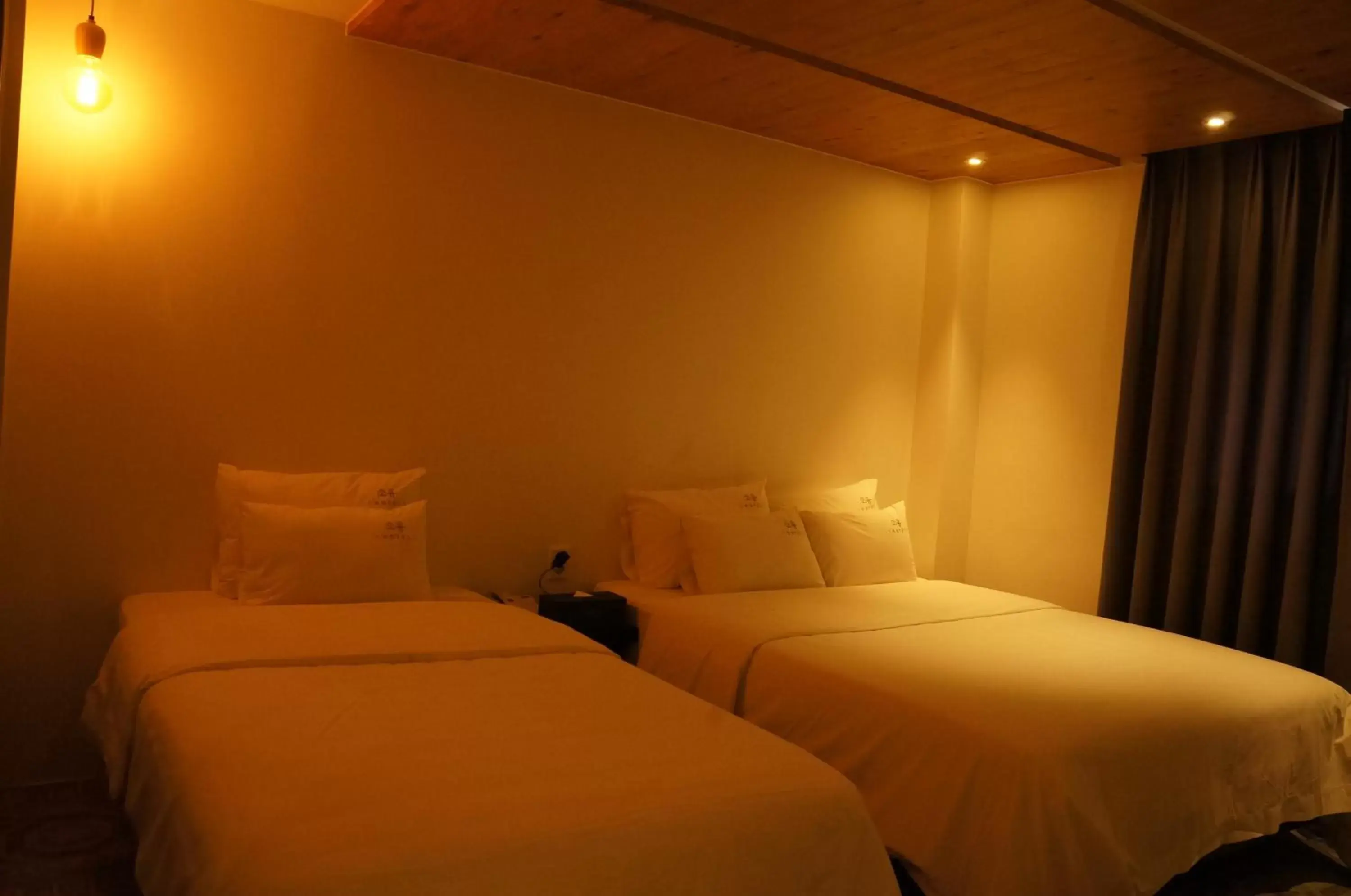 Bed in SOYU Hotel
