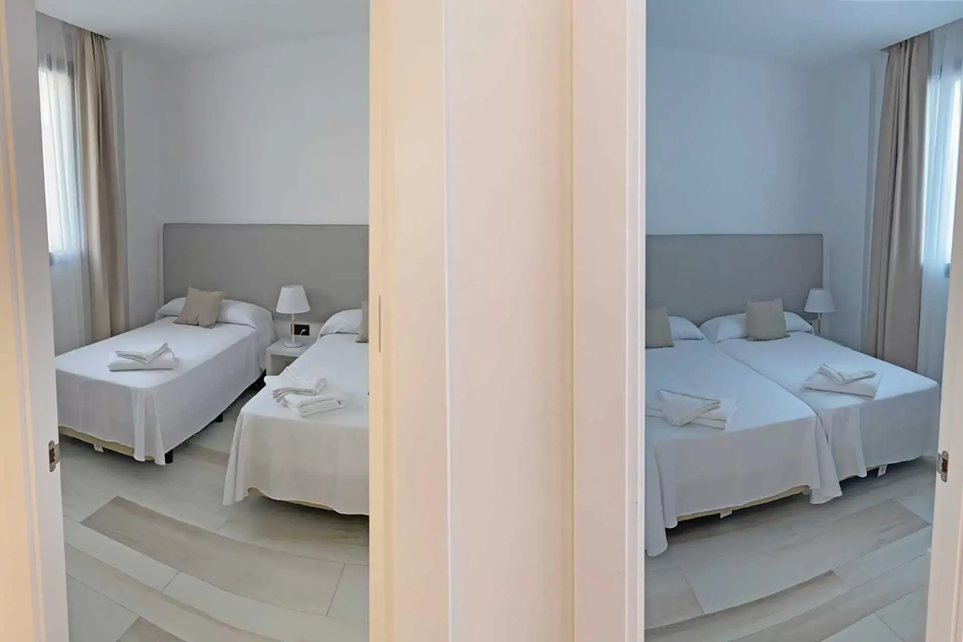 Bed in AZAHAR BEACH Apartments & Spa