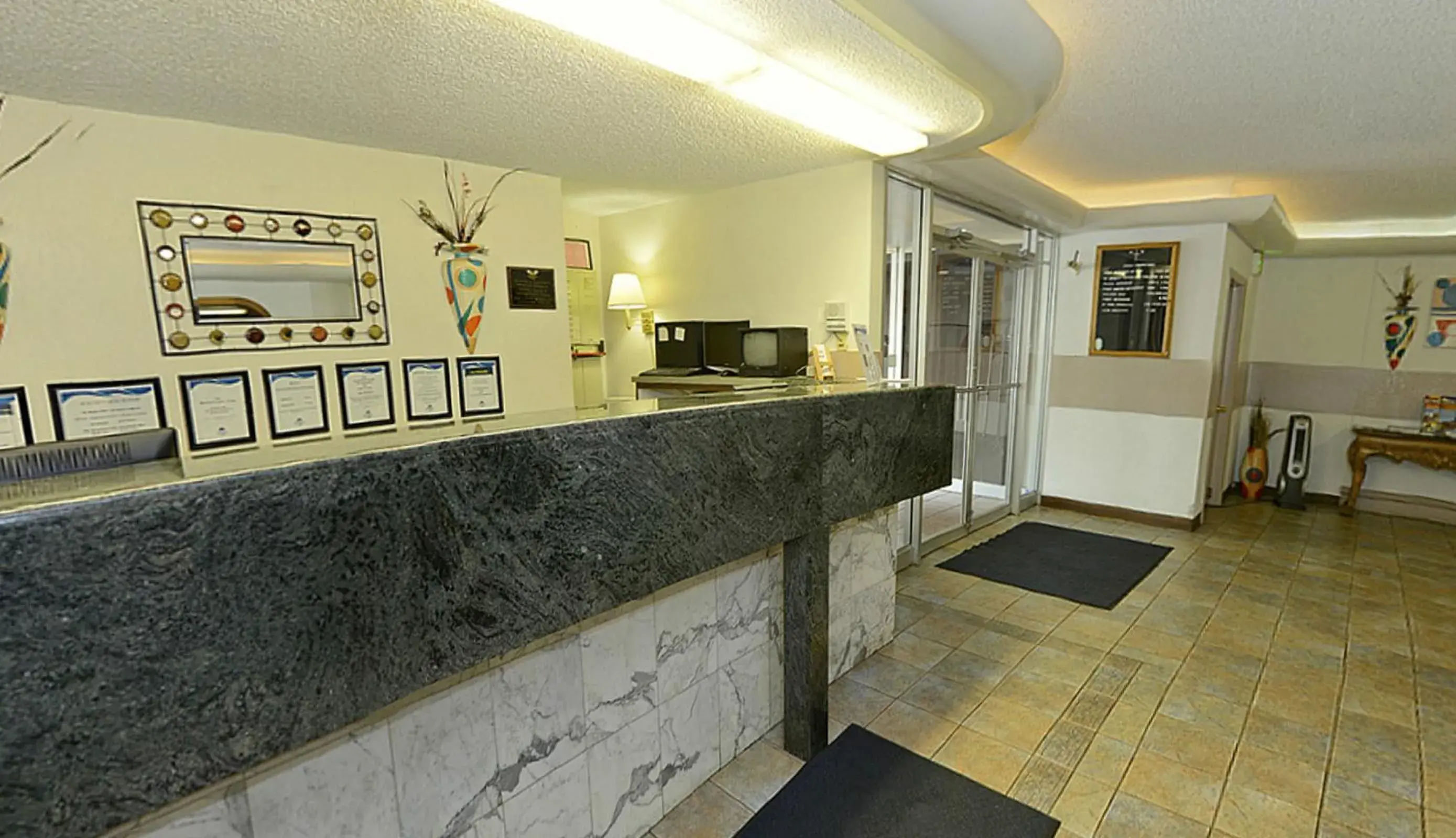 Lobby or reception in Howard Johnson by Wyndham Saint Joseph Benton Harbor Lobby or reception in Howard Johnson by Wyndham Saint Joseph Benton Harbor