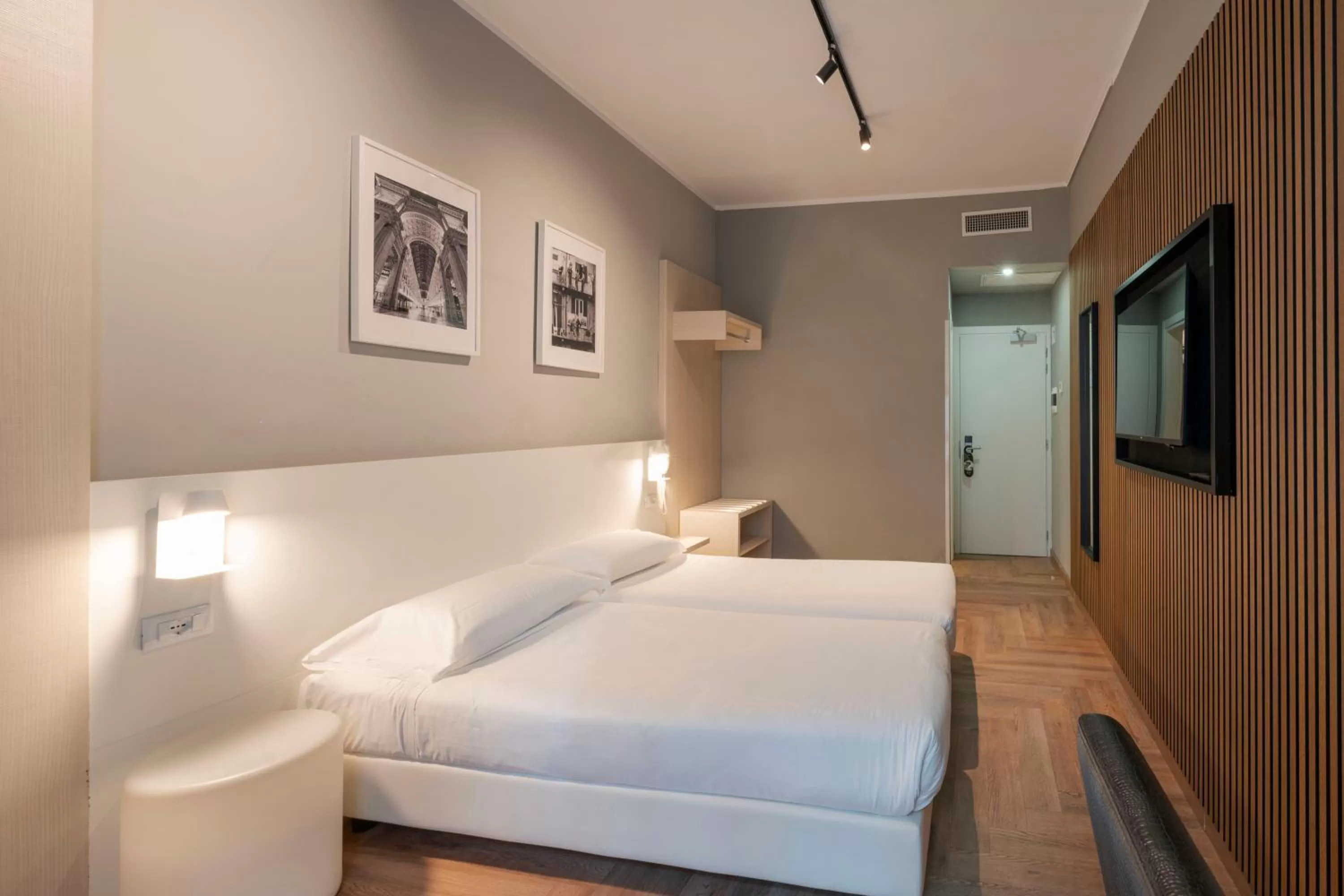 Bed in Kleos Hotel Milano Città Studi by Kleos Group Collection