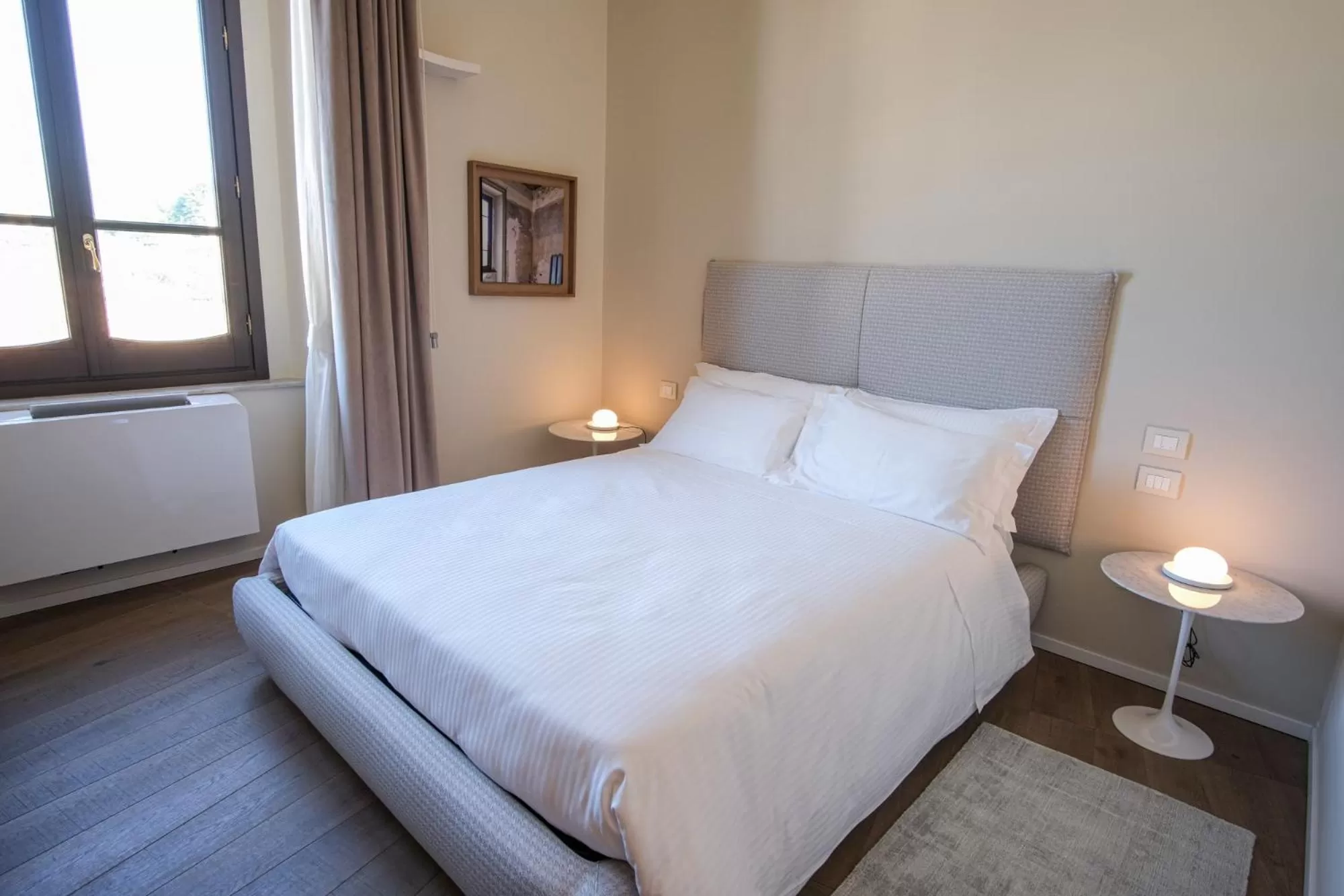 Bed in Dimora de Matera Luxury Suites