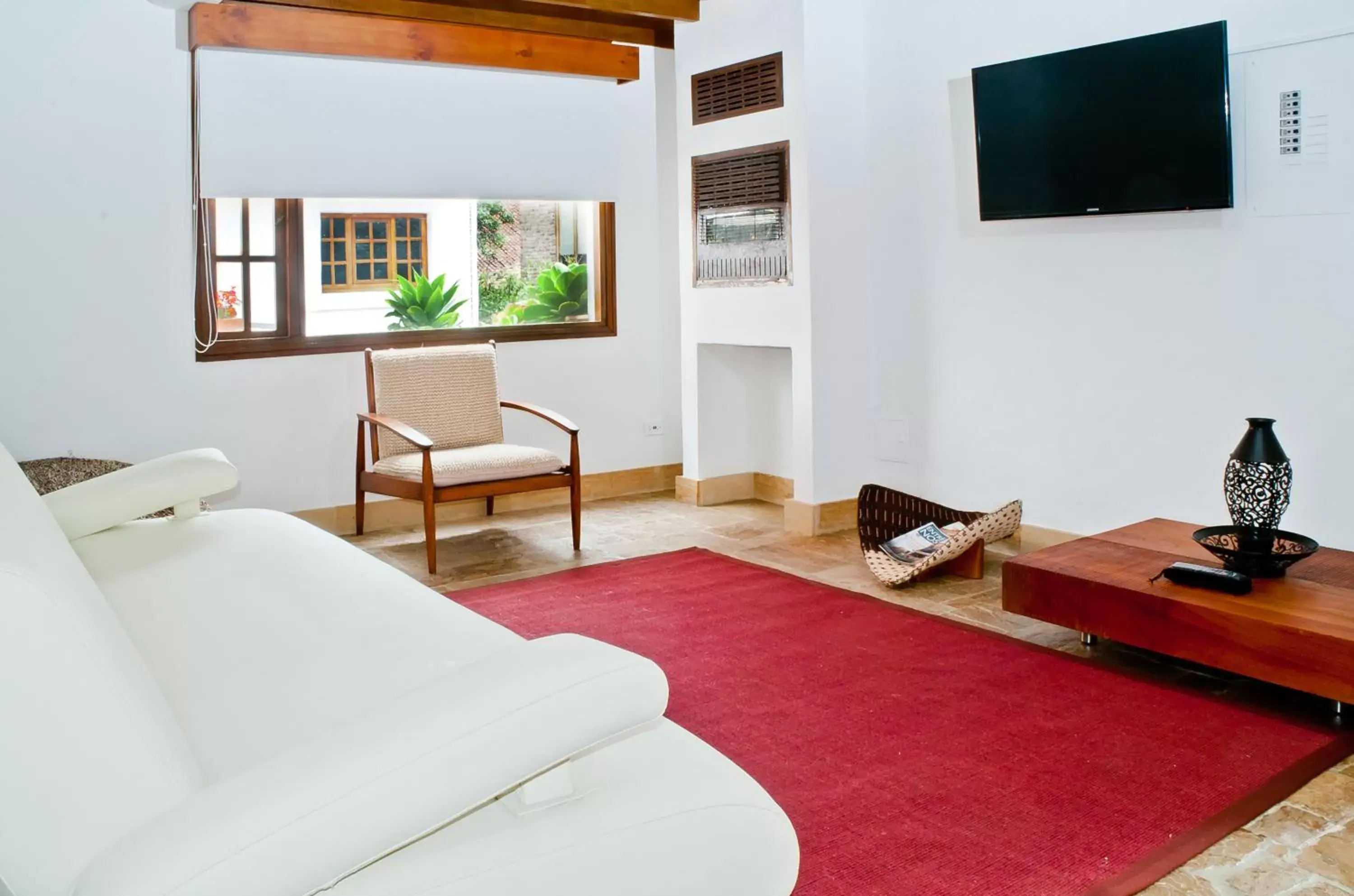 Communal lounge/ TV room, Seating Area in Hotel Casona Usaquen