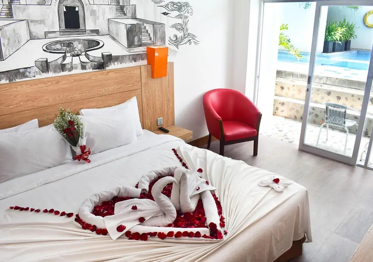 Decorative detail, Bed in Abadi Hotel Malioboro Yogyakarta Decorative detail, Bed in Abadi Hotel Malioboro Yogyakarta