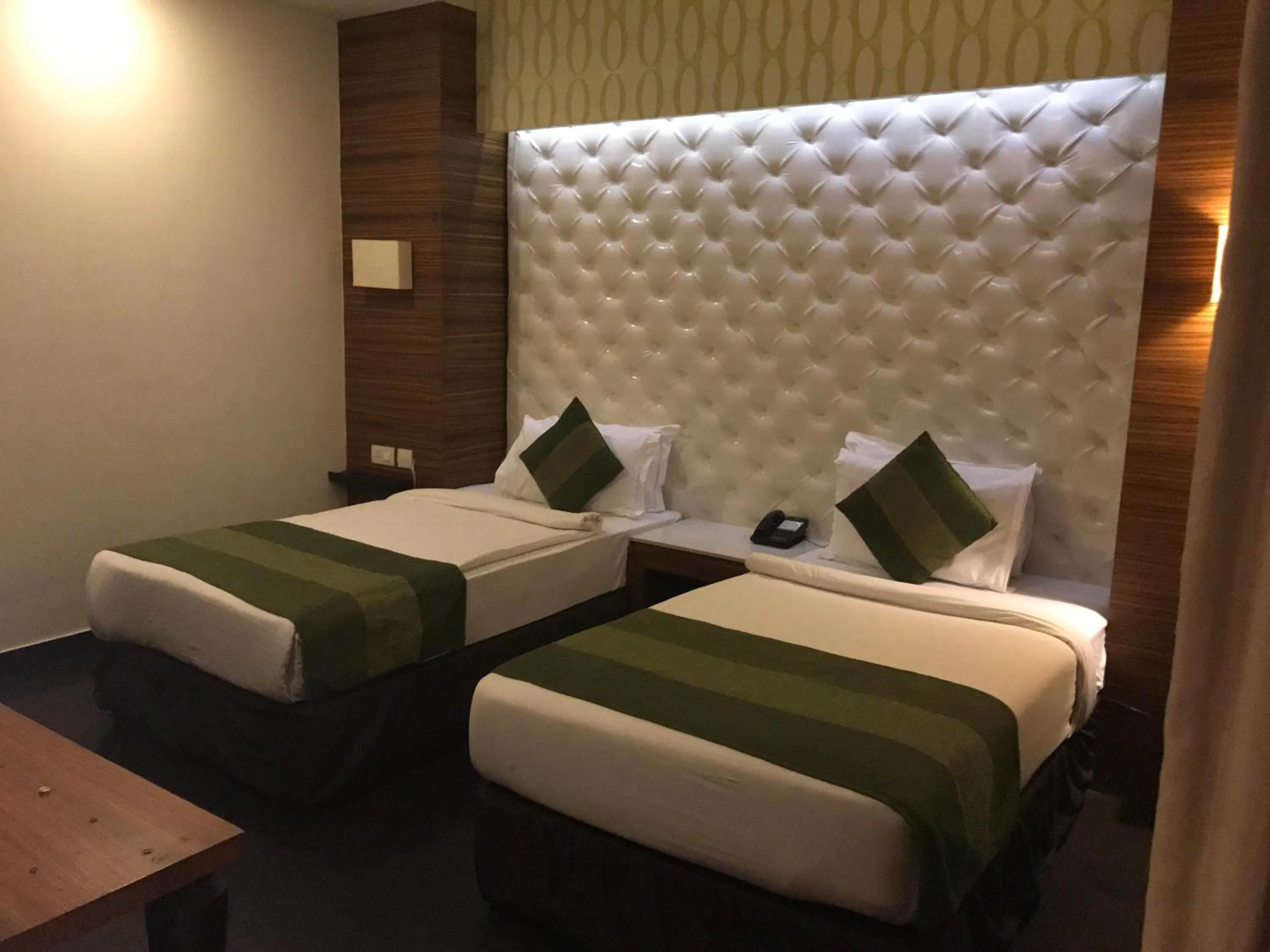 Bed in Hotel Ivory 32