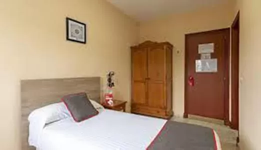 Bed in HOSTAL-RESTAURANTE EL PAISANO