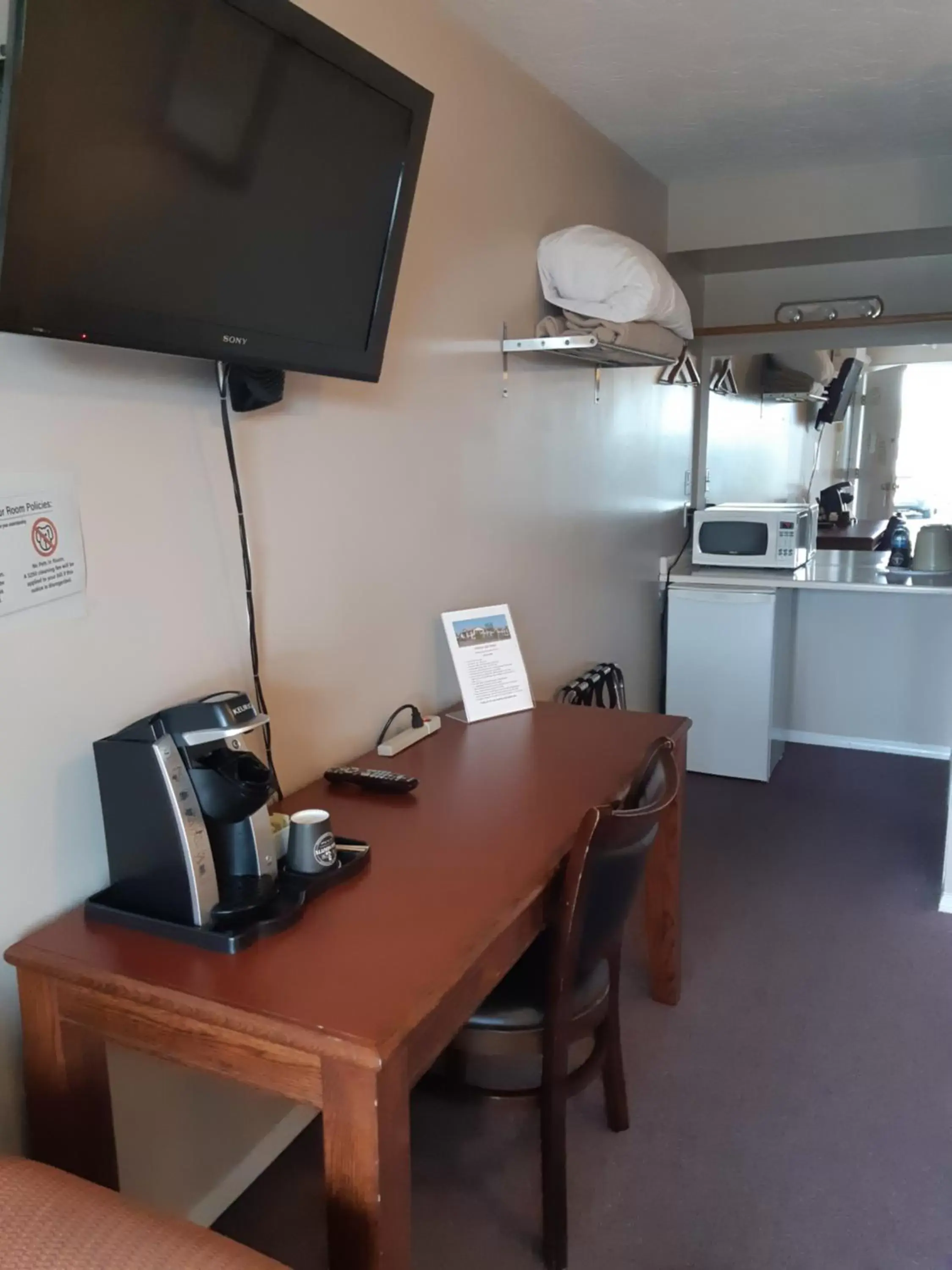 TV and multimedia, TV/Entertainment Center in Harbour Light Motel