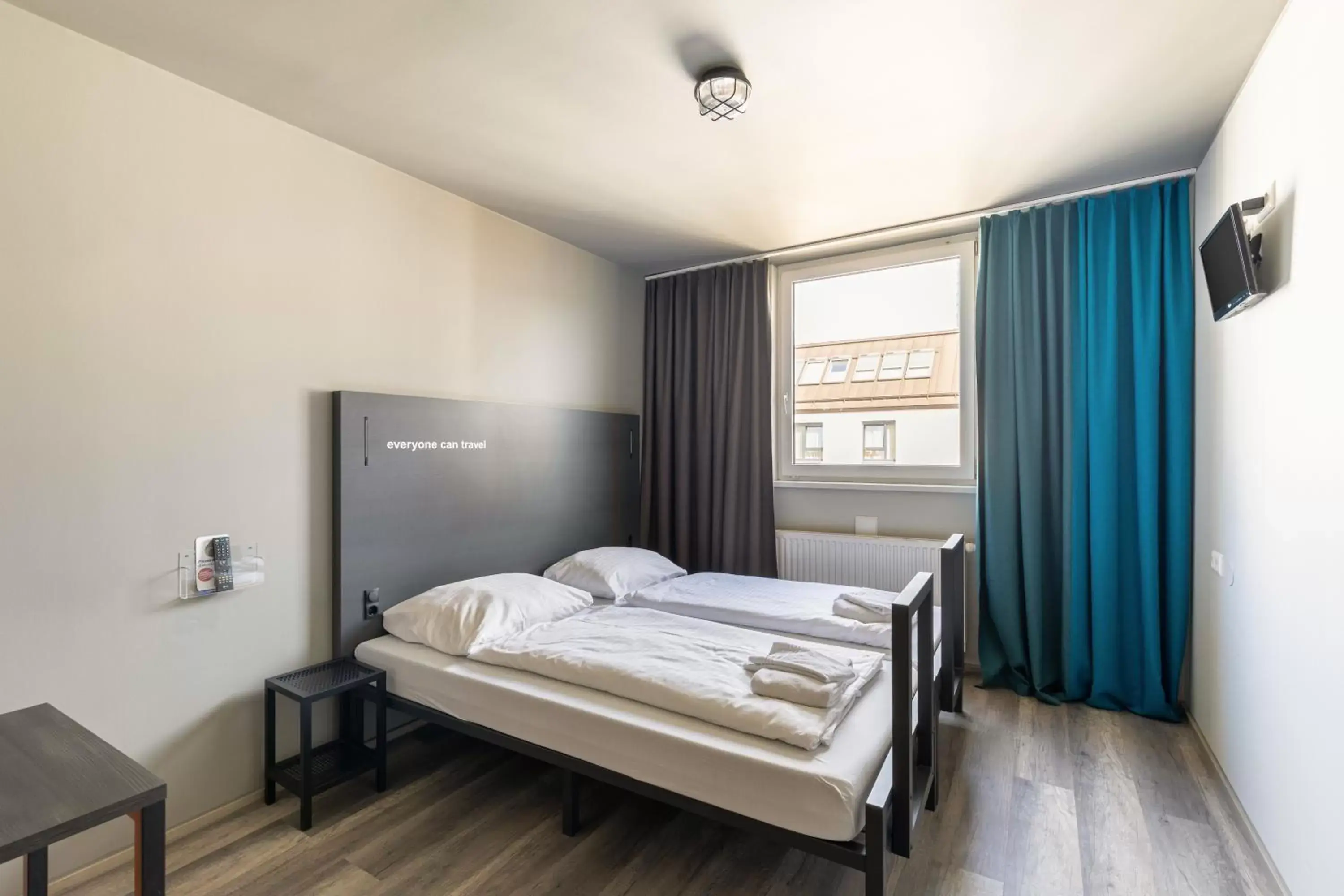 Photo of the whole room, Bed in A&O Wien Hauptbahnhof