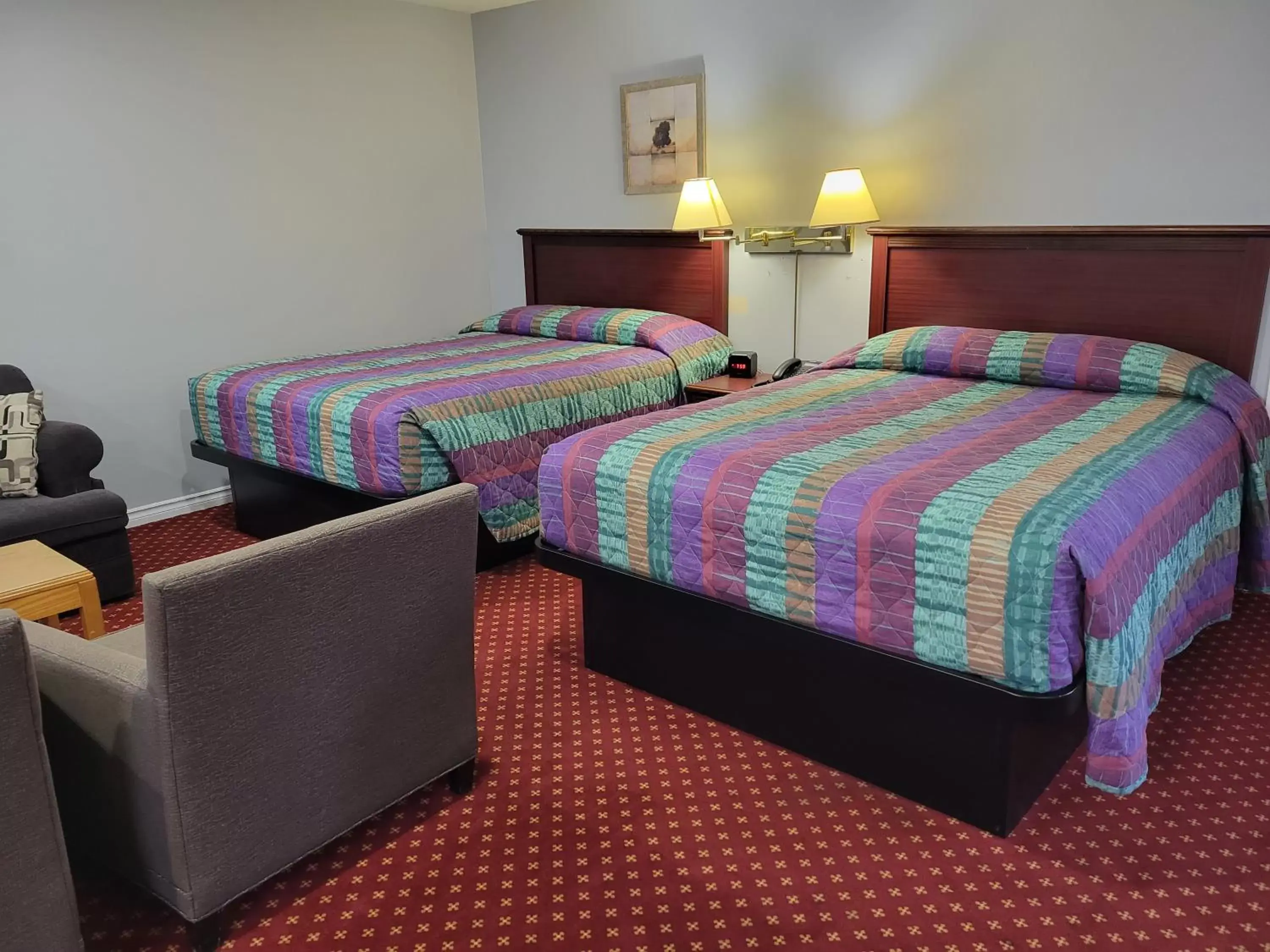 Bed in Knights Inn Cobourg