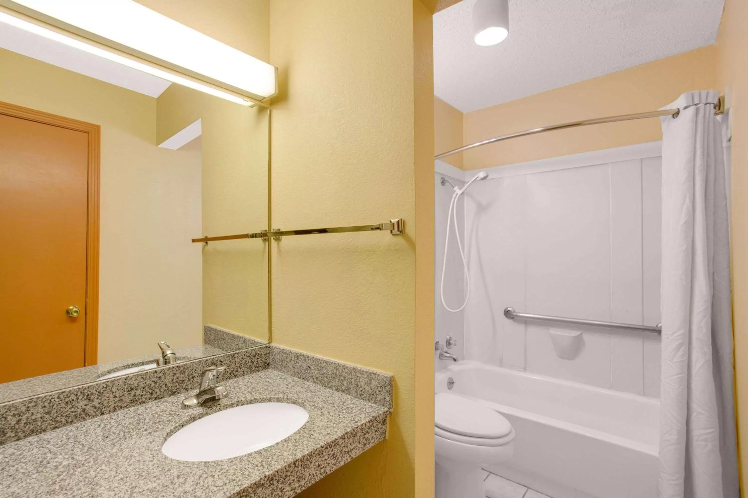 Bathroom in Super 8 by Wyndham Monticello AR