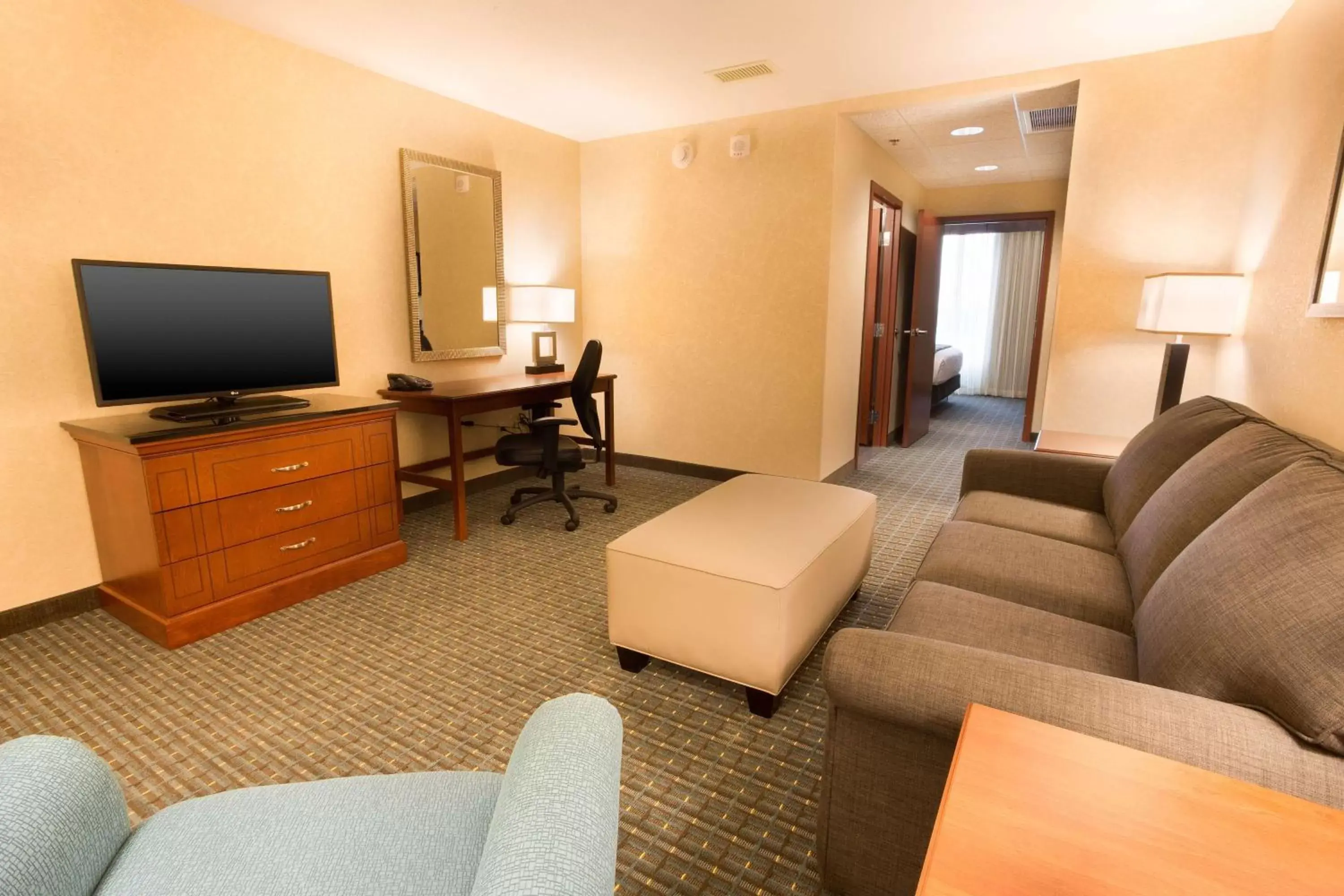 Photo of the whole room, TV/Entertainment Center in Drury Inn & Suites St. Louis Brentwood