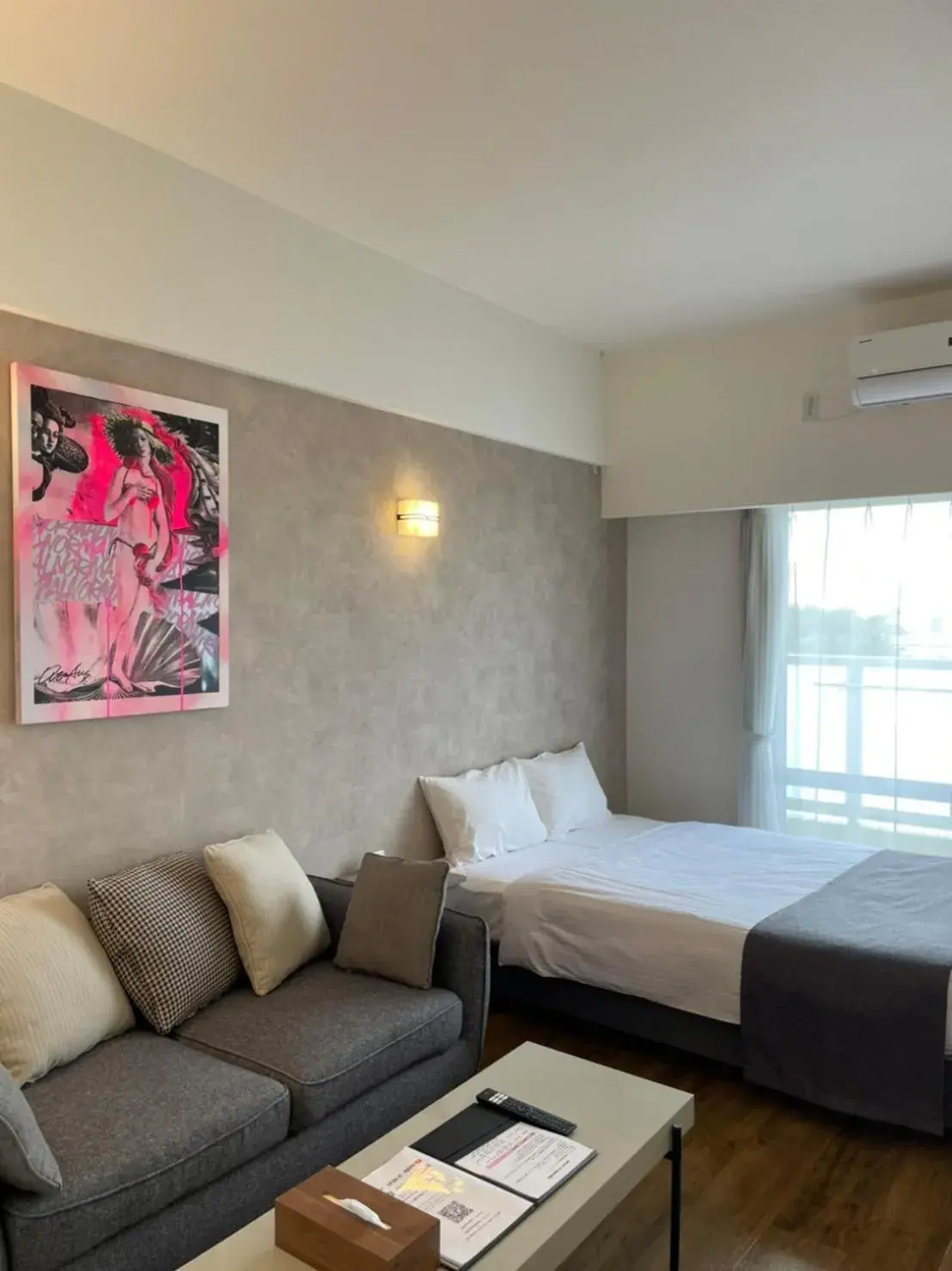 Photo of the whole room in New Normal Hotel in NAMINOUE