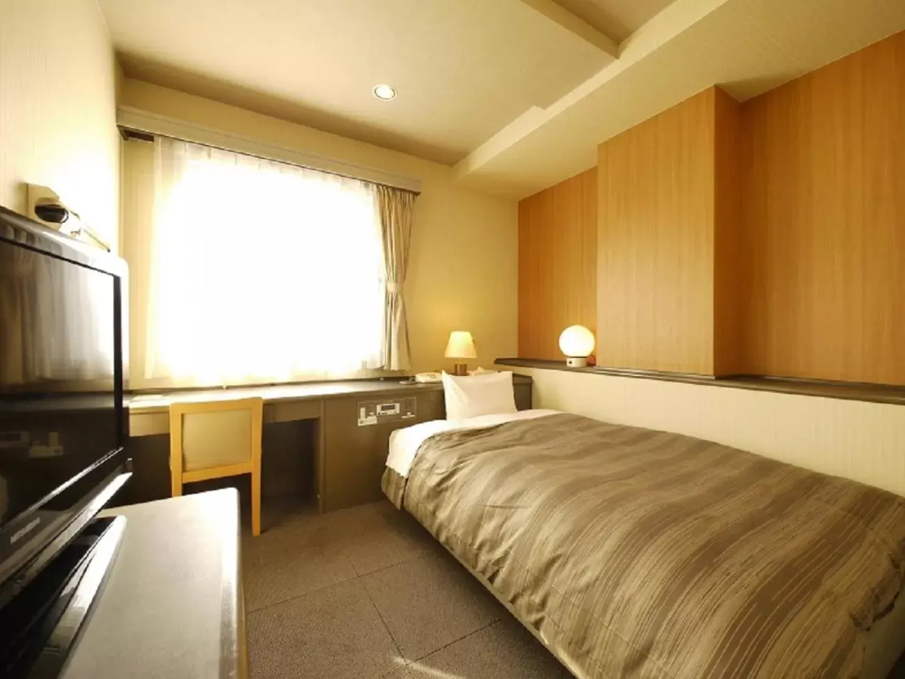 Bed in Hotel Route-Inn Court Chikuma-Koshoku