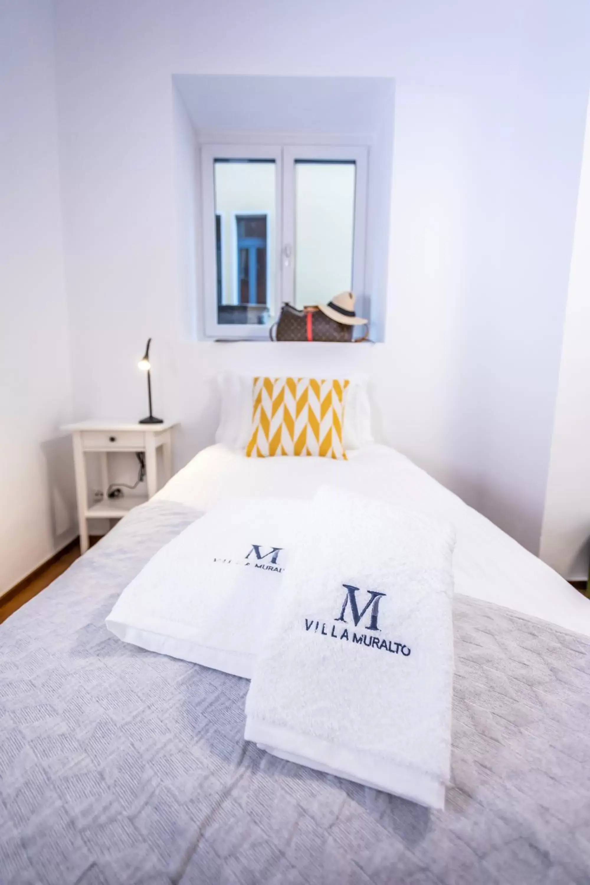 Bed in Villa Muralto Rooms & Garden