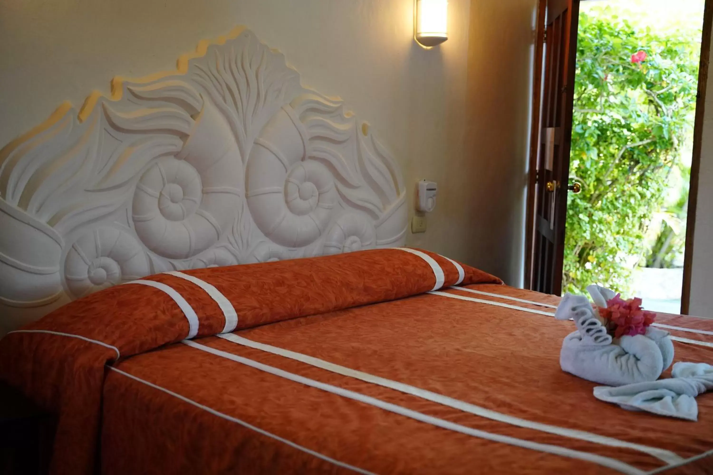 Bedroom in Villablanca Garden Beach Hotel