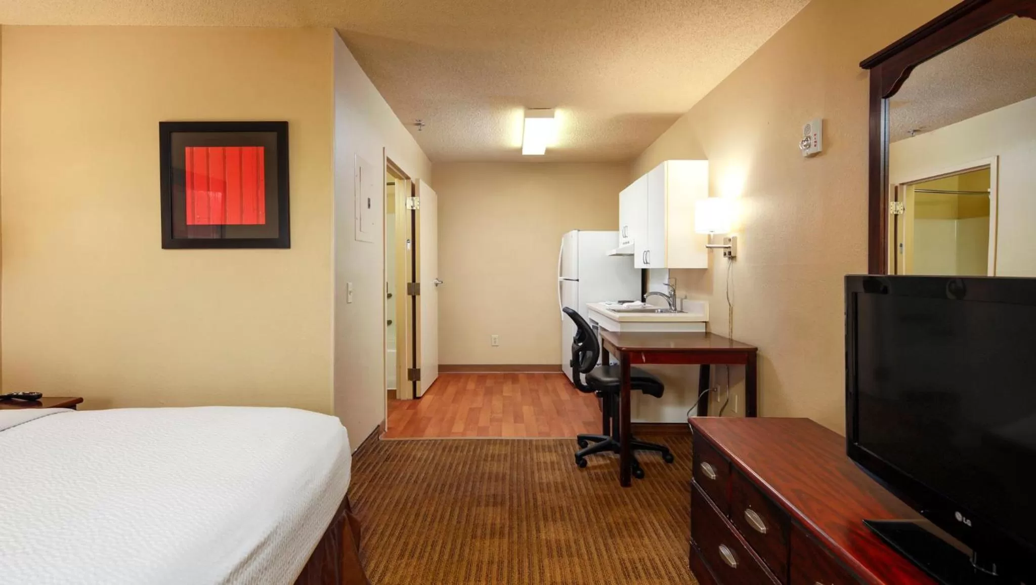 Bedroom, Bed in Home 1 Suites Extended Stay