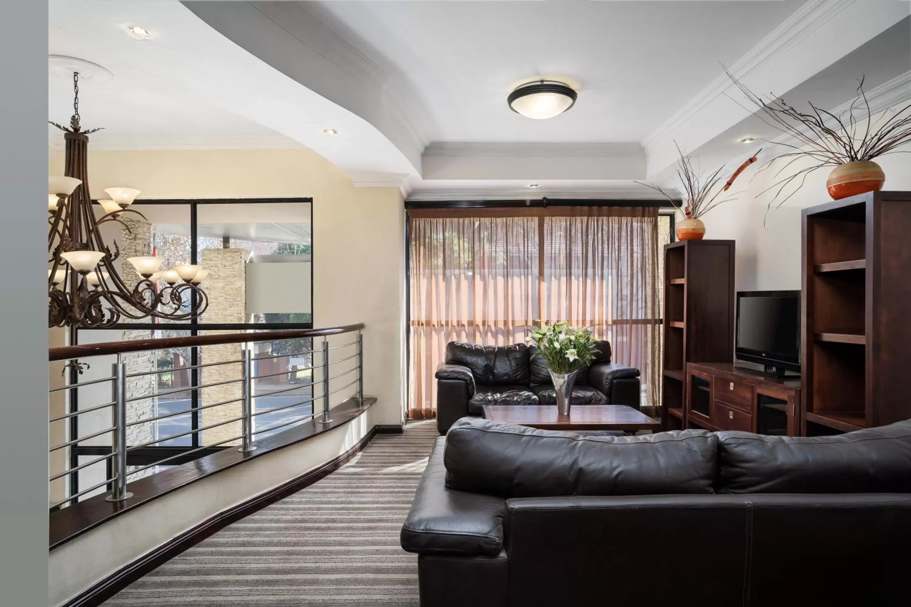 Communal lounge/ TV room, Seating Area in Premier Hotel Pretoria