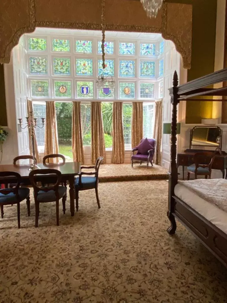 Bedroom in Langtry Manor Hotel