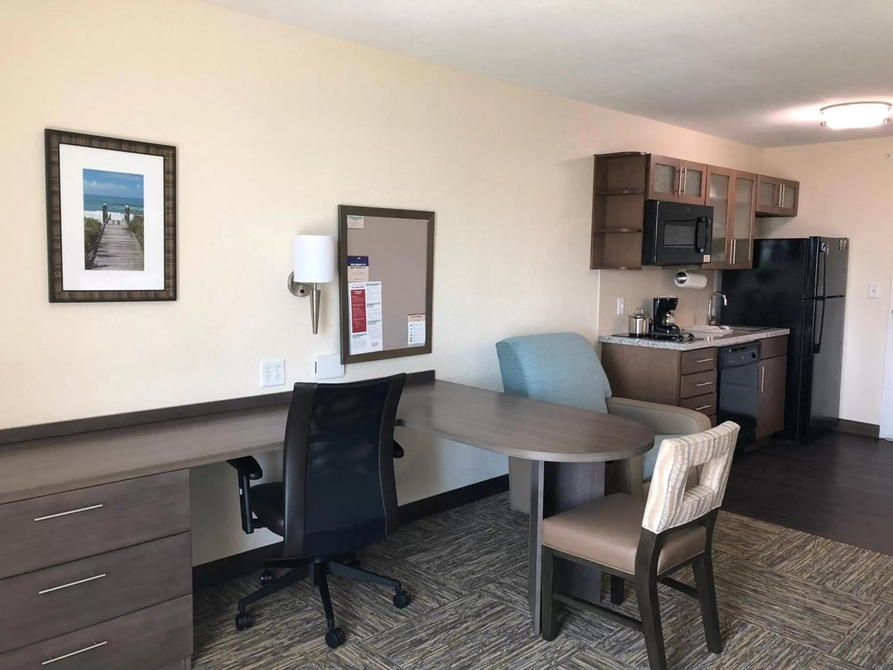 Photo of the whole room, Kitchen/Kitchenette in Candlewood Suites - Panama City Beach Pier Park, an IHG Hotel