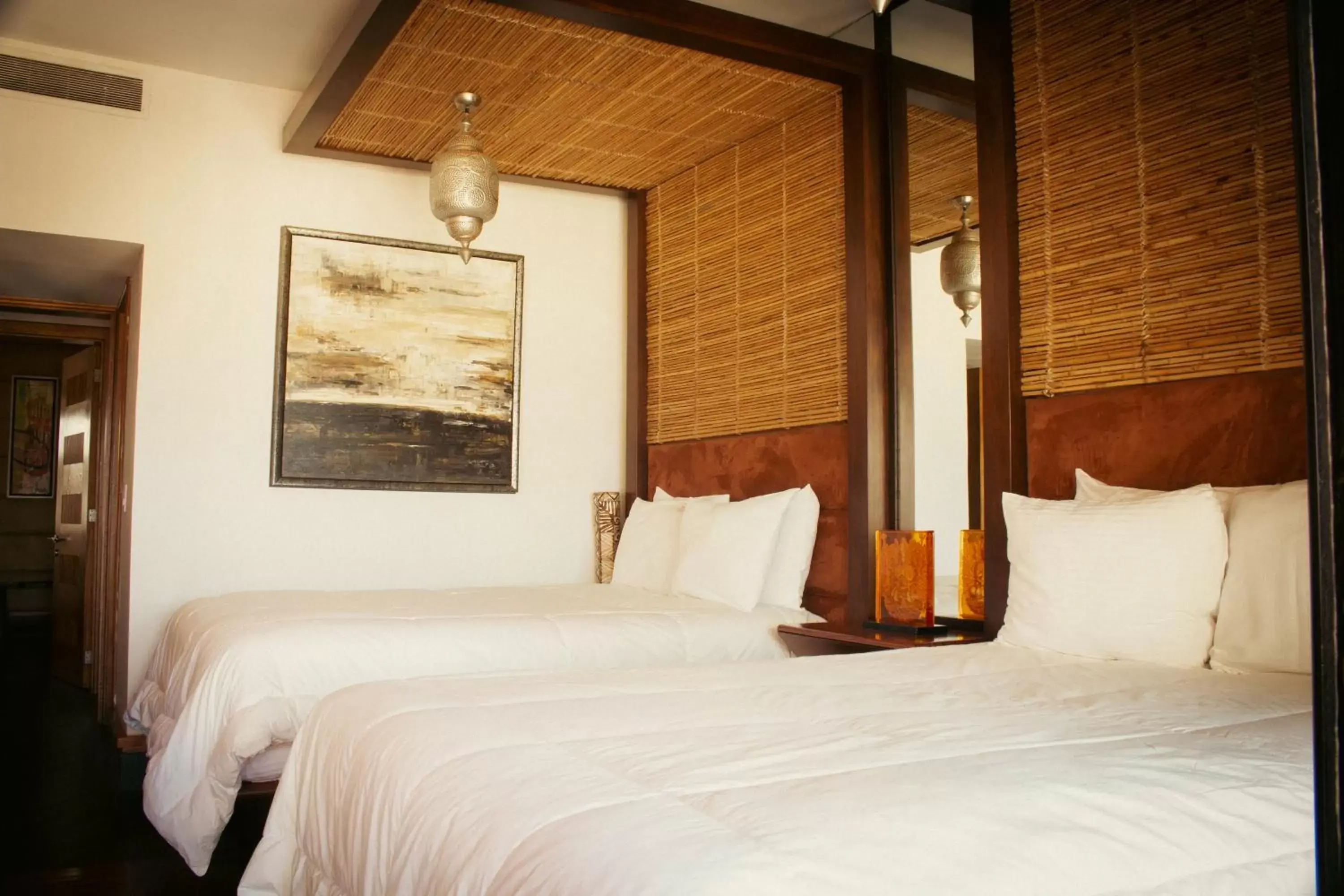 Bed in Aldea Thai