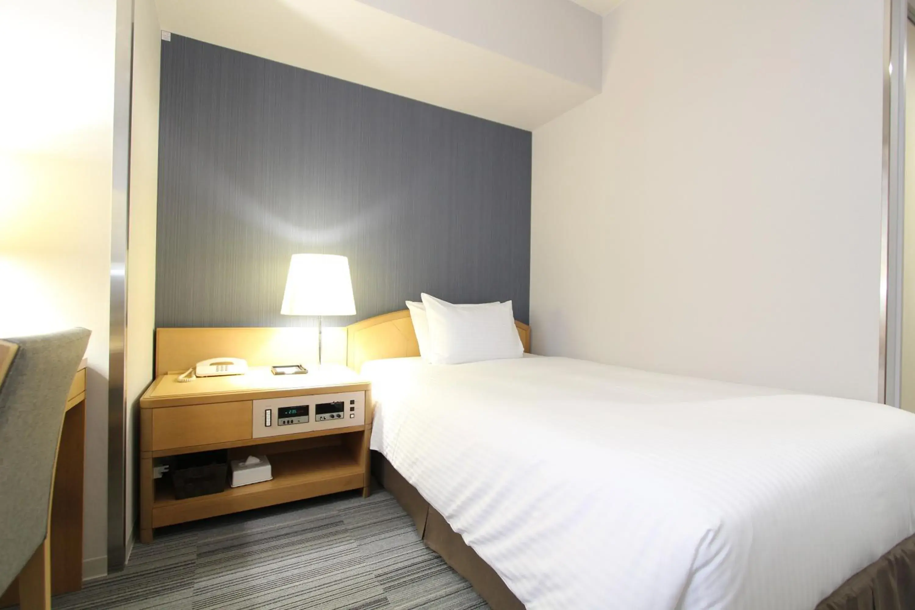 Bed in SureStay Plus Hotel by Best Western Shin-Osaka