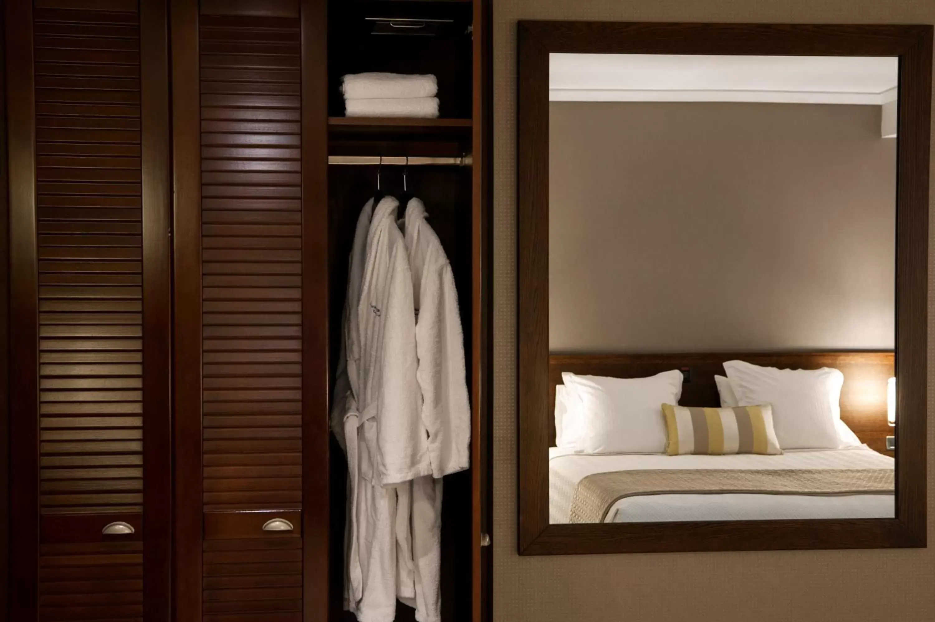 wardrobe, Bed in The Athenian Callirhoe Exclusive Hotel