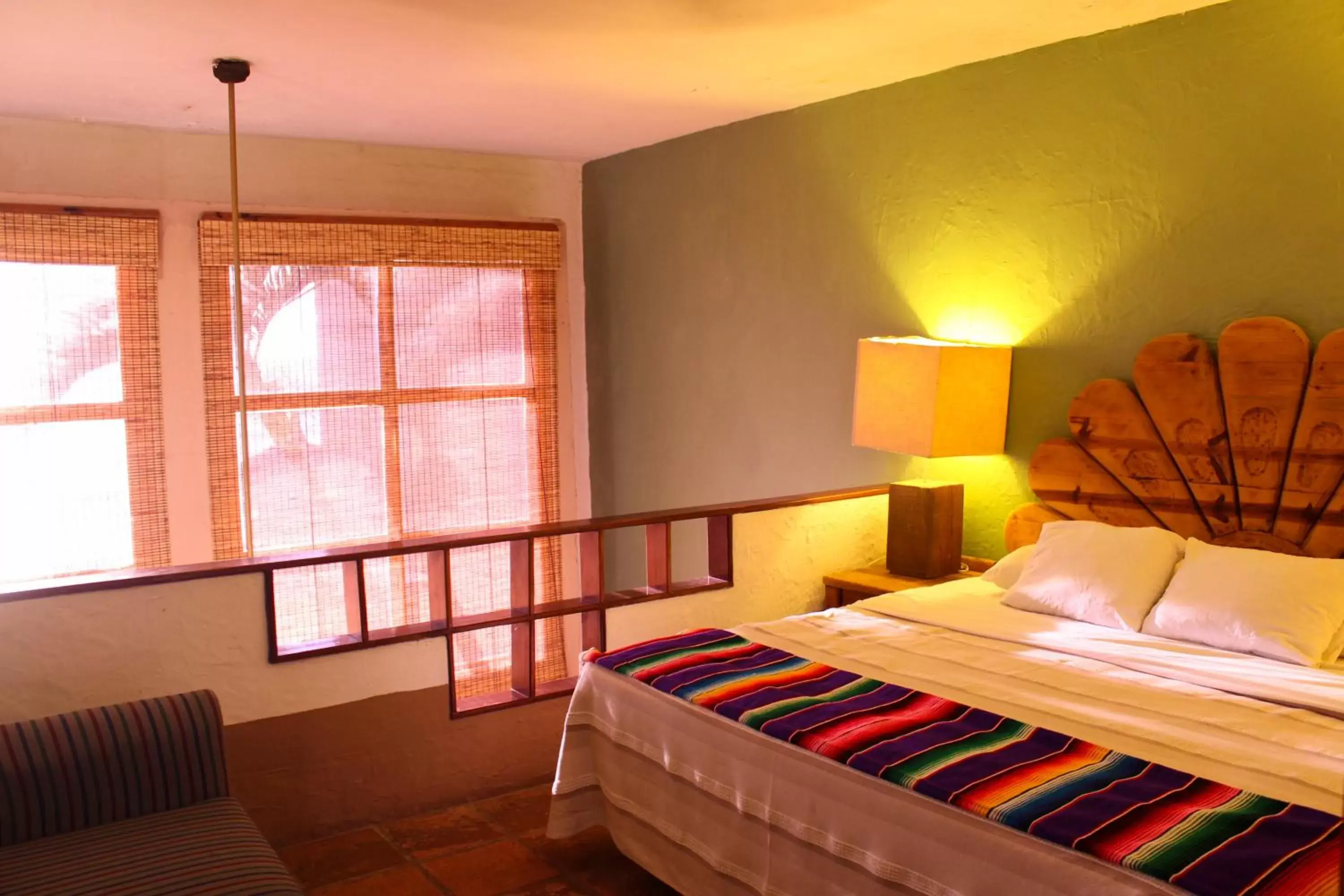 Bed in Villas El Rancho Green Resort