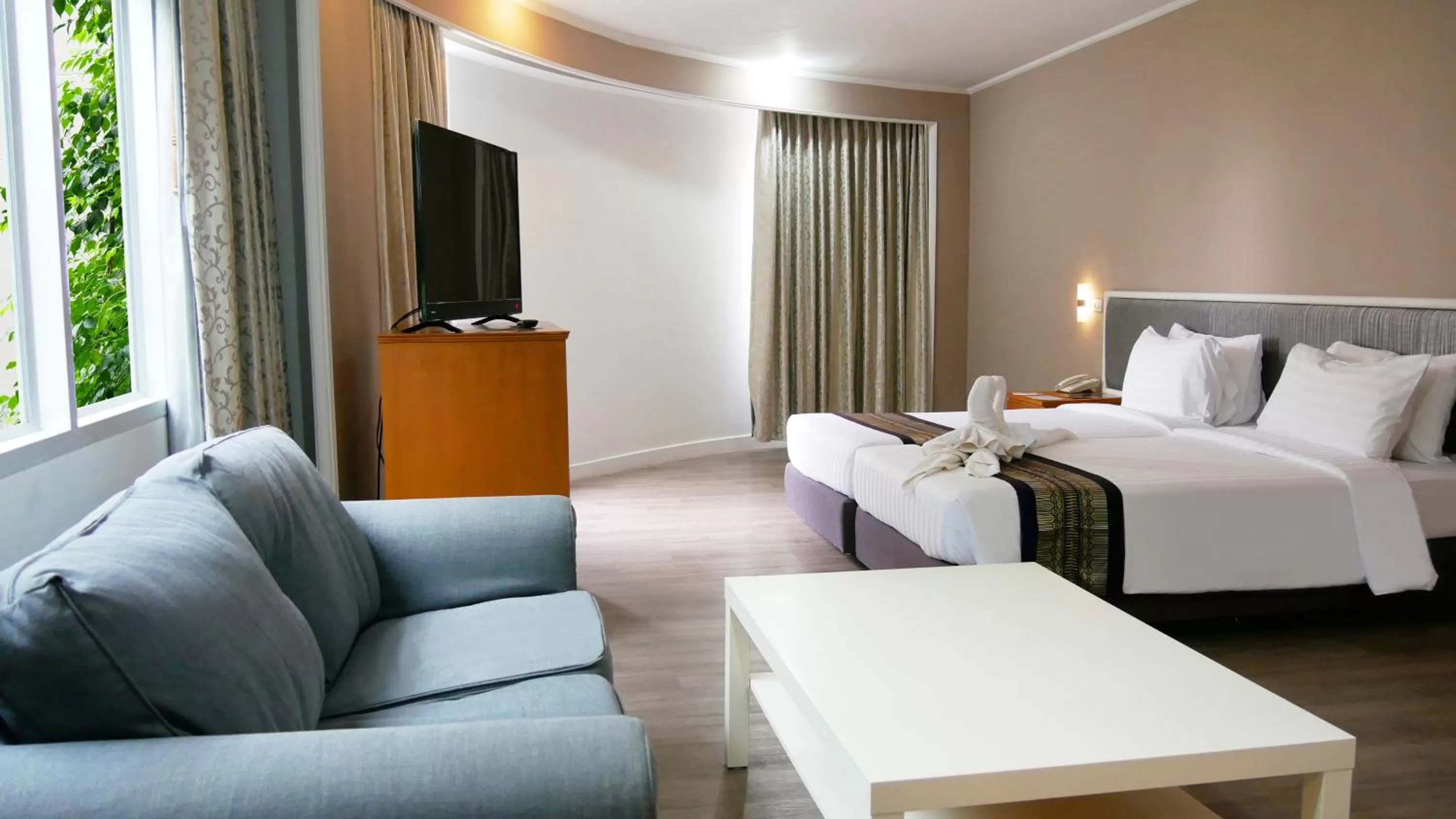 Bed in Trang Hotel Bangkok - SHA Plus