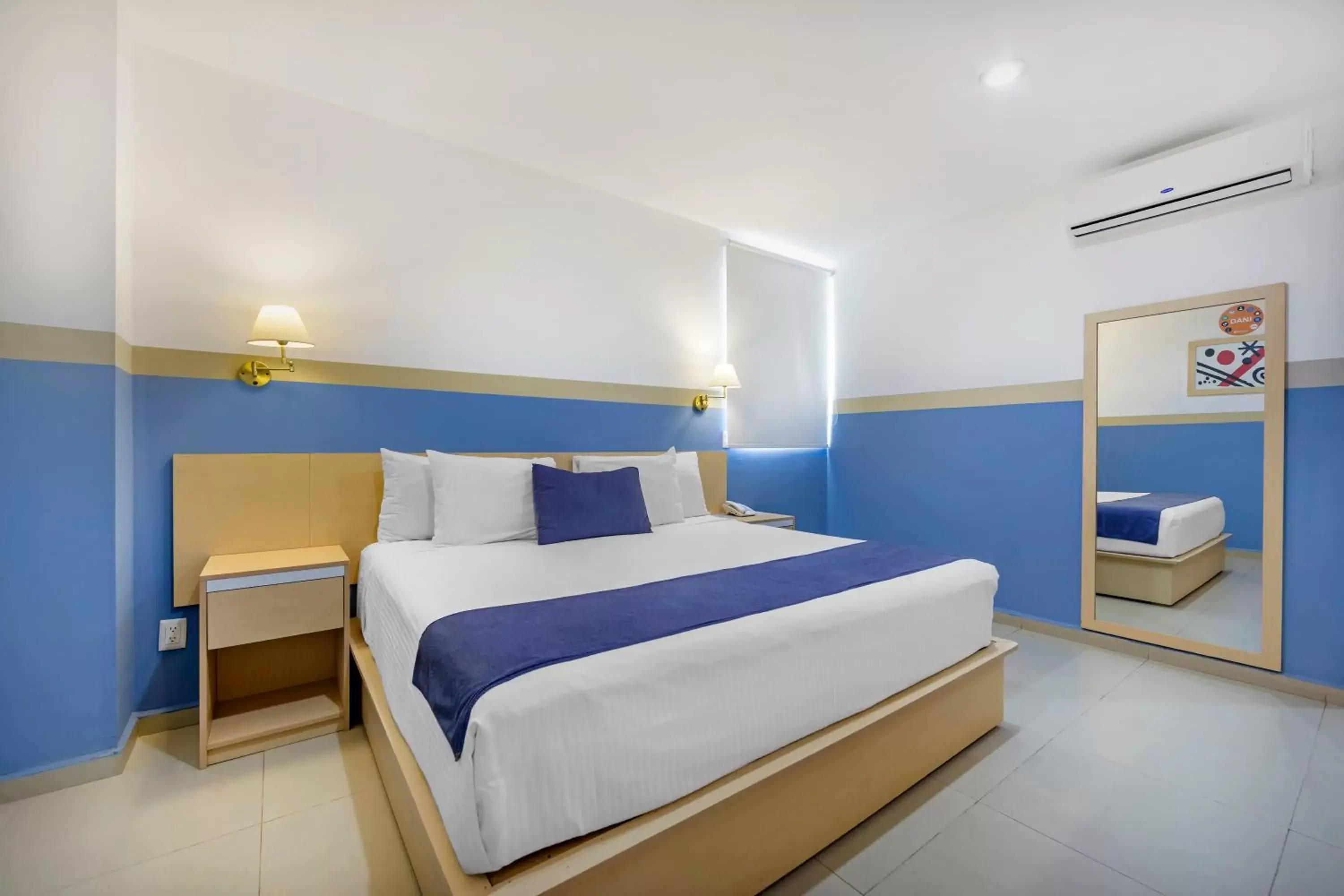 Bed in Sleep Inn Tuxtla