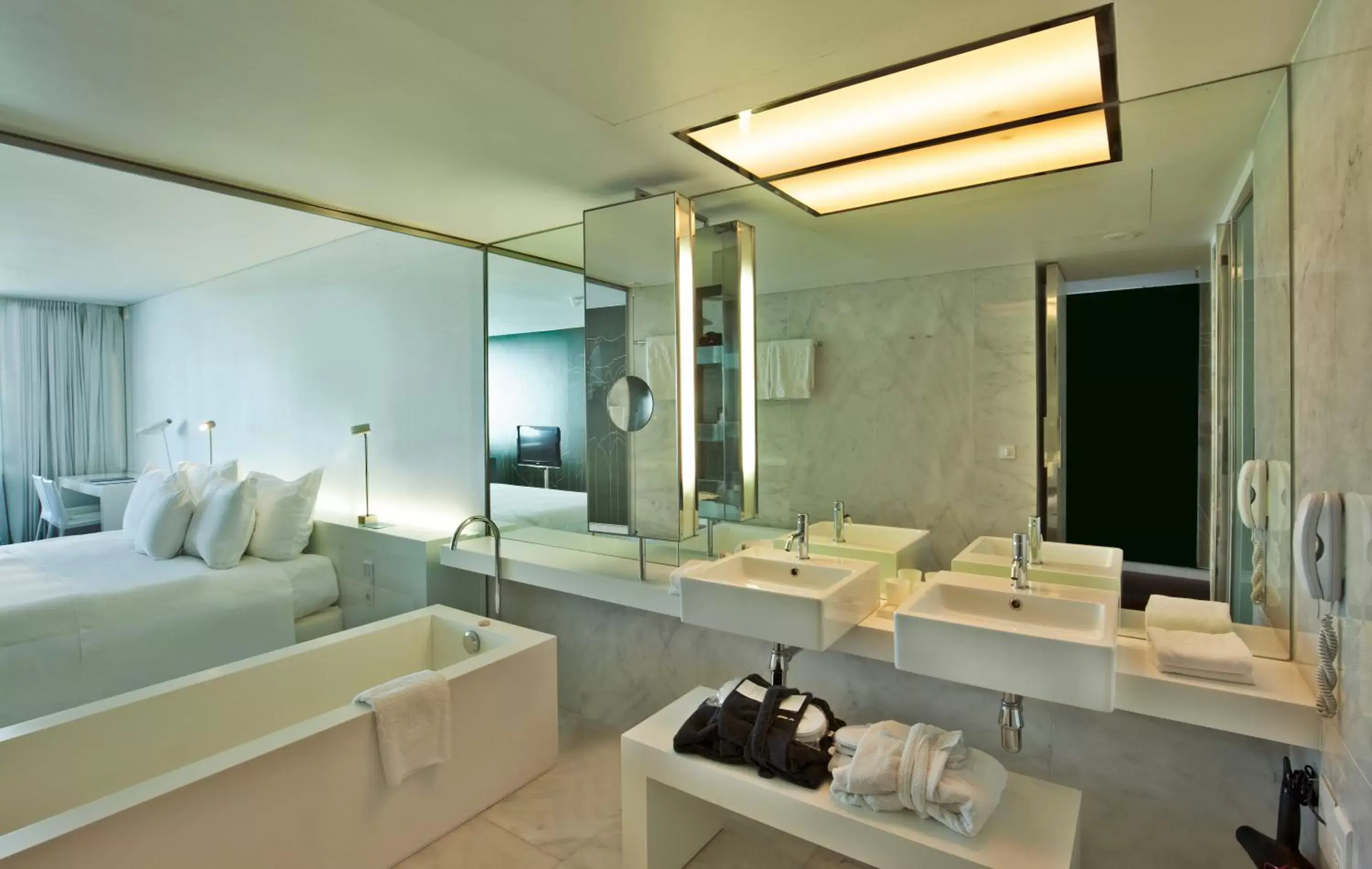 Bed, Bathroom in Altis Belem Hotel & Spa - Design Hotels
