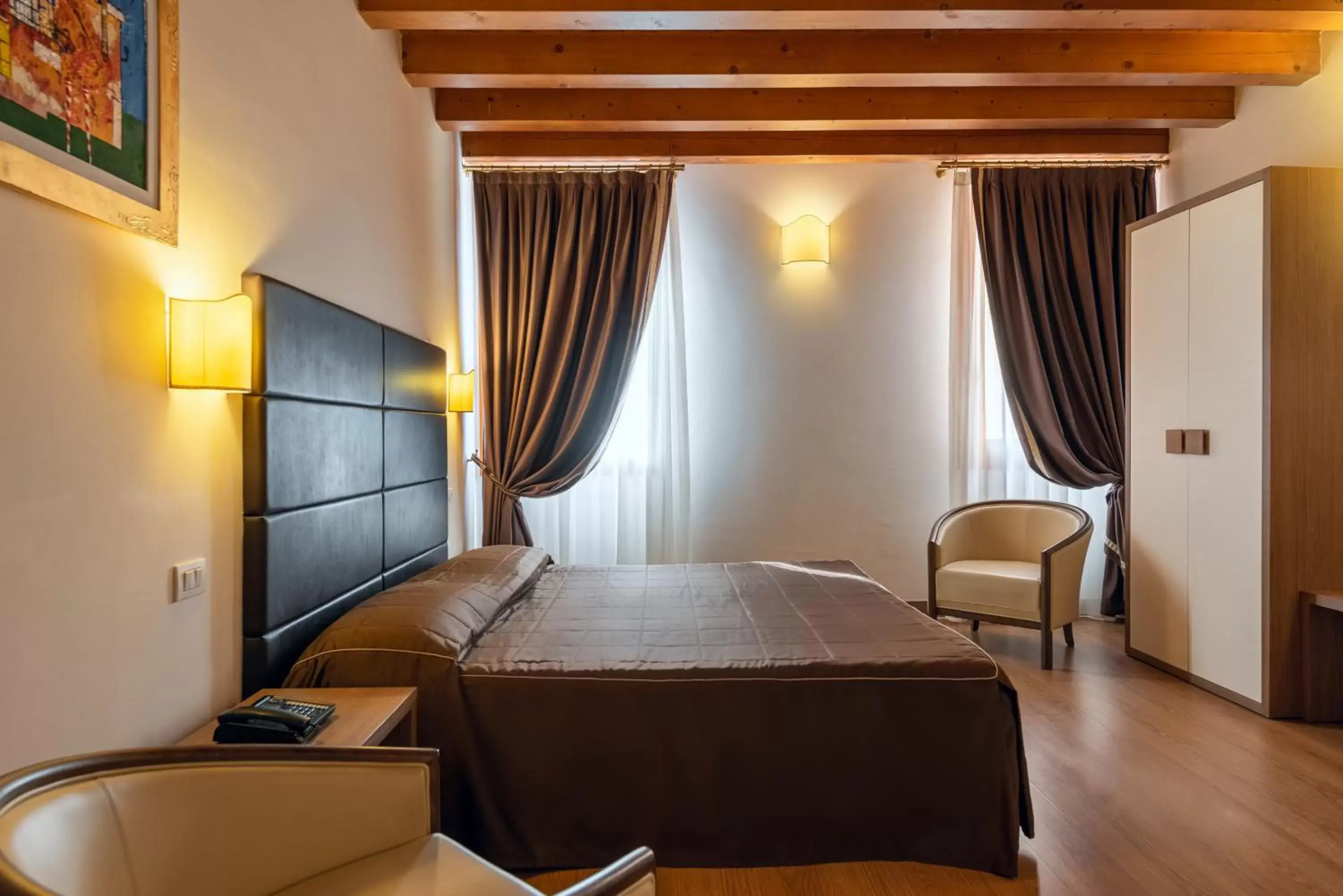 Bed in UNAWAY Ecohotel Villa Costanza Venezia