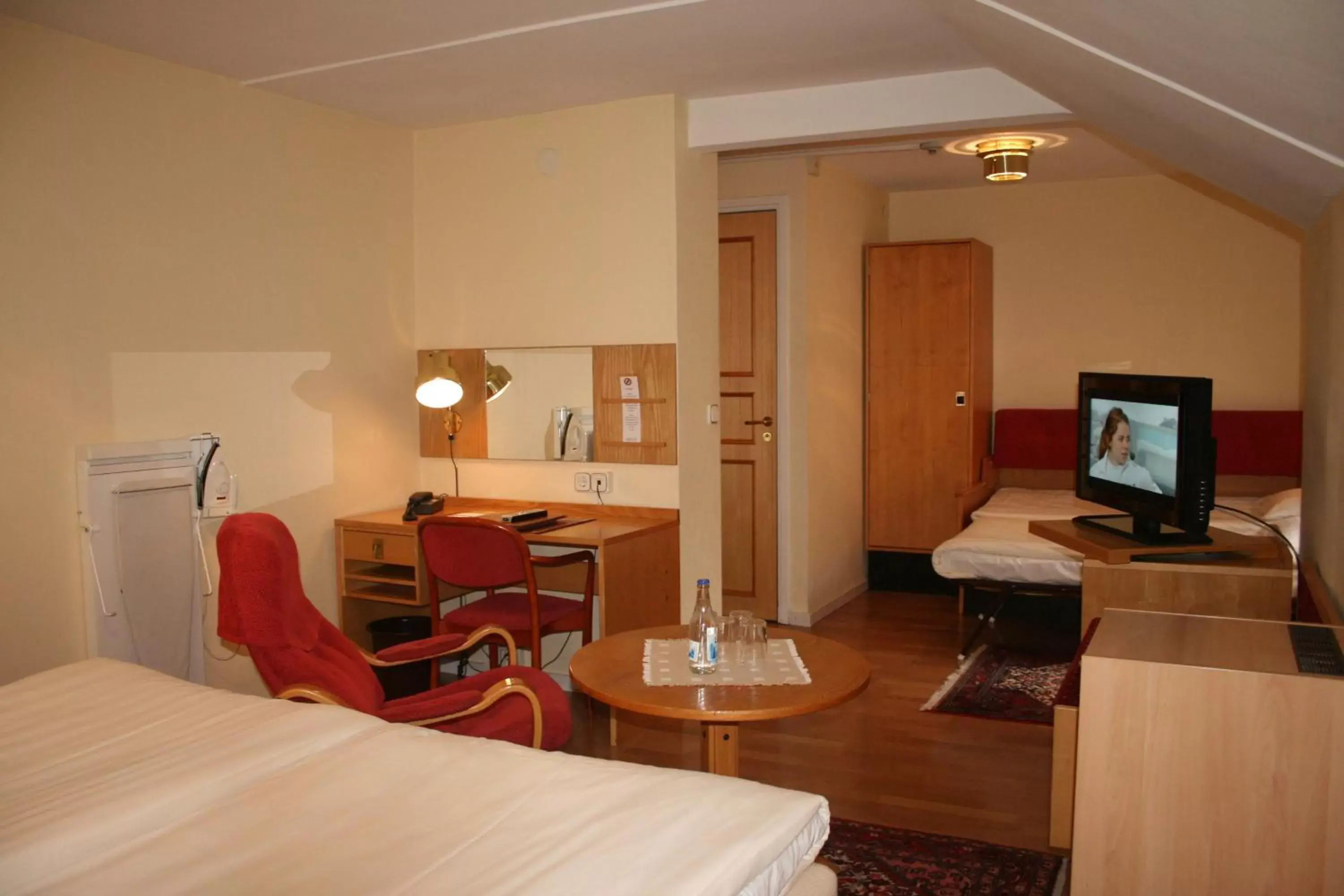 Photo of the whole room, TV/Entertainment Center in Hotel Örgryte