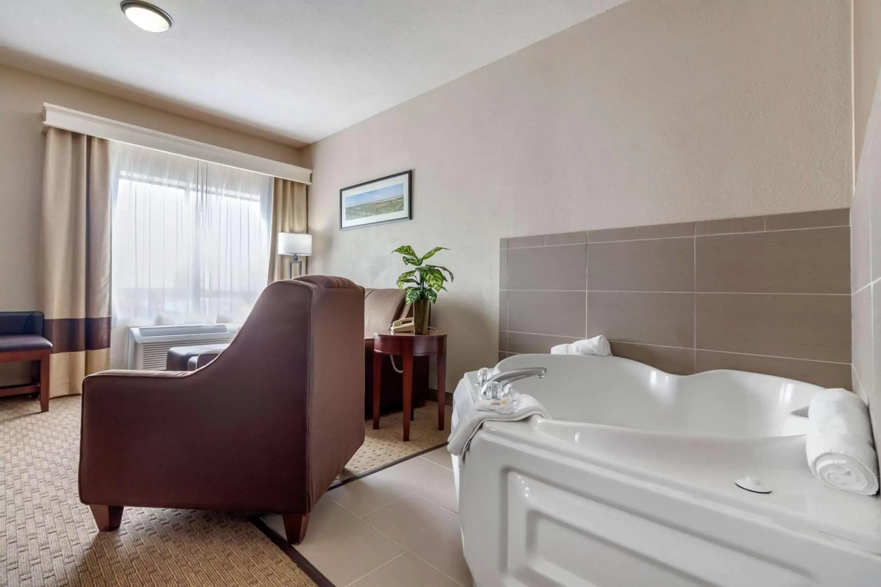 Bedroom in Comfort Suites Omaha East-Council Bluffs