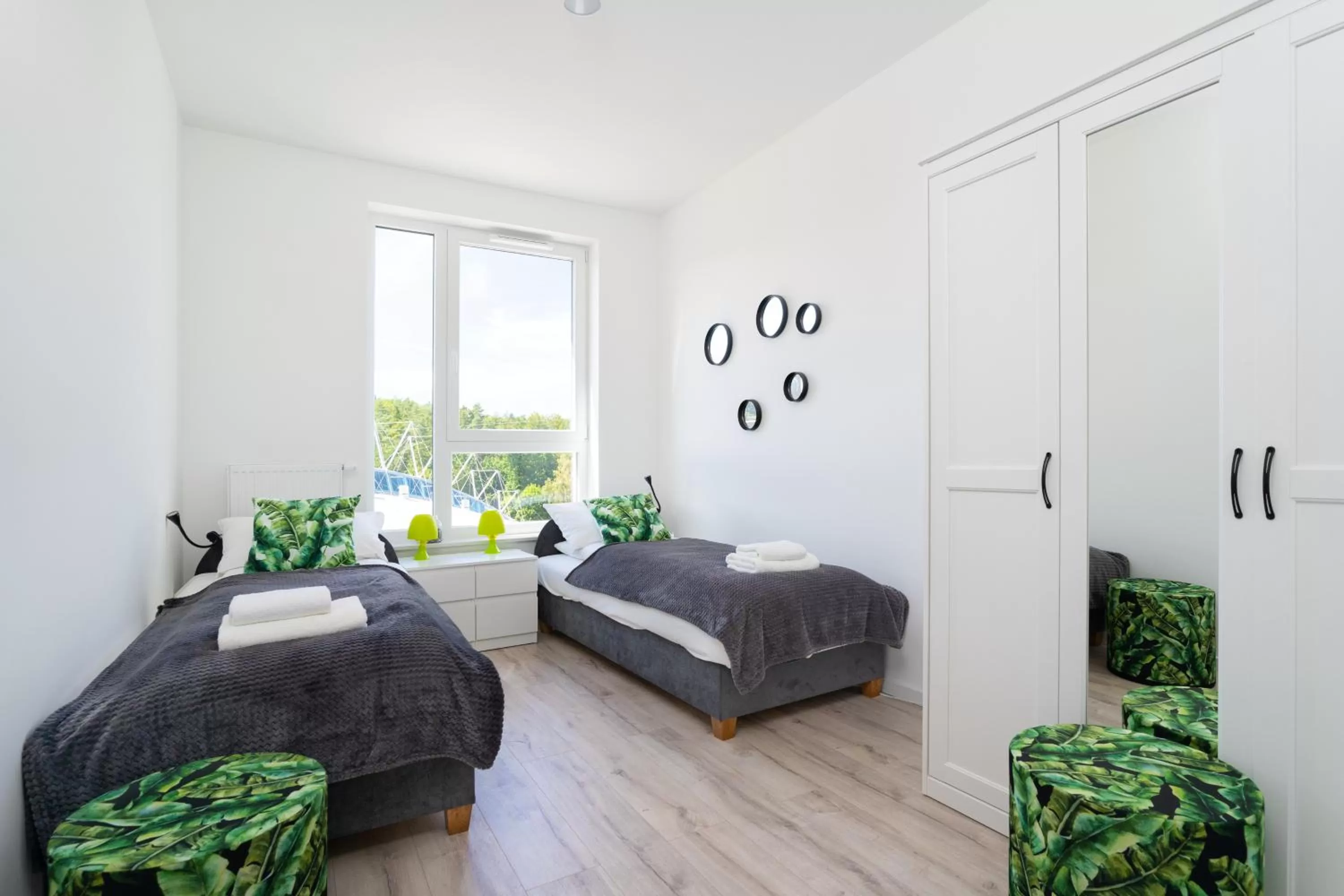 Bed in Symphony Modern Tower Apartamenty