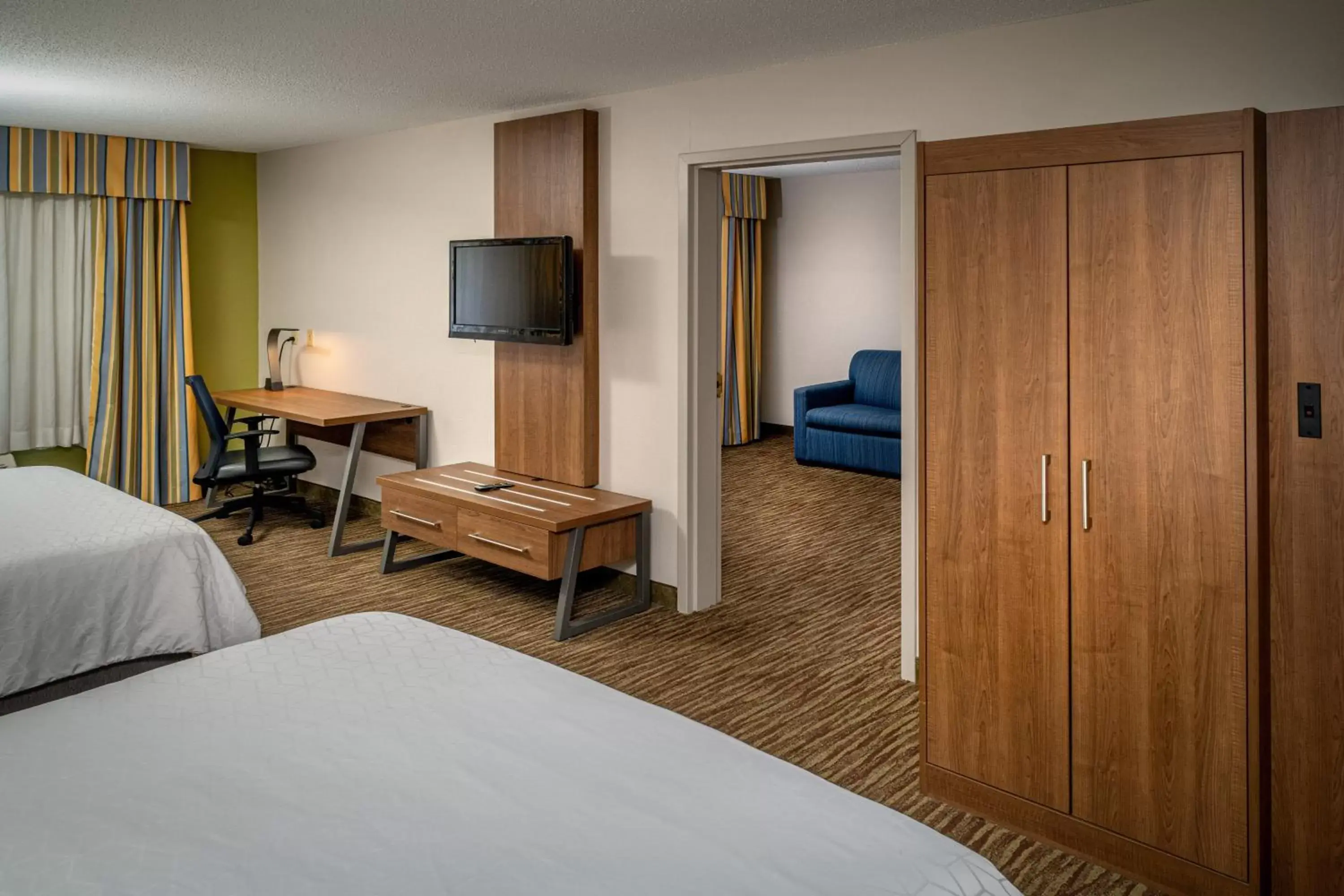 Photo of the whole room, TV/Entertainment Center in Holiday Inn Express and Suites Pikeville, an IHG Hotel
