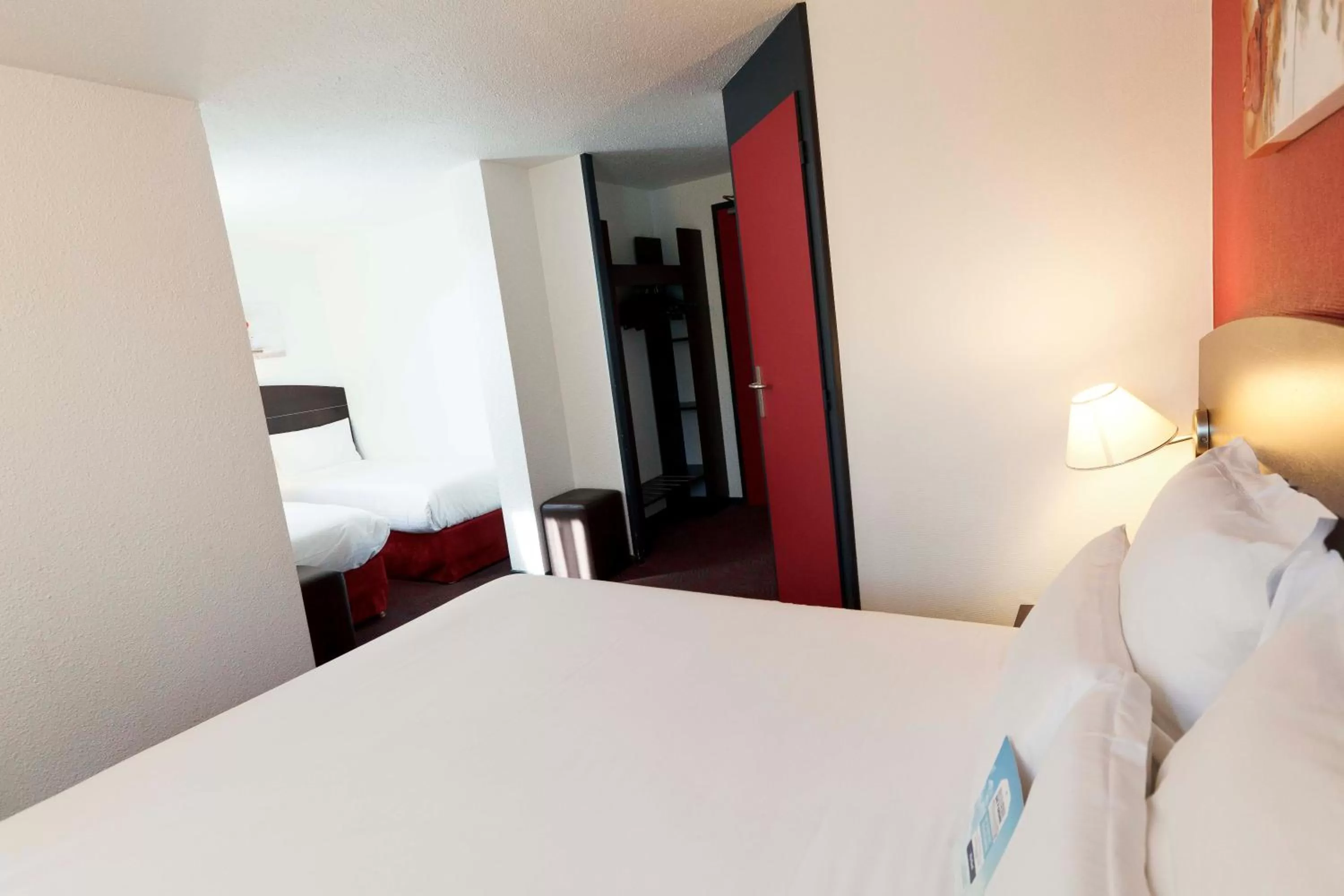 Photo of the whole room, Bed in Kyriad Lyon Sud - Saint Genis Laval