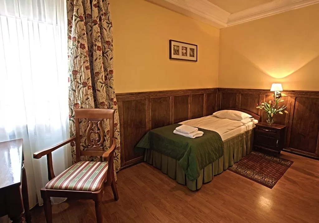 Bed in Hotel Kresowianka