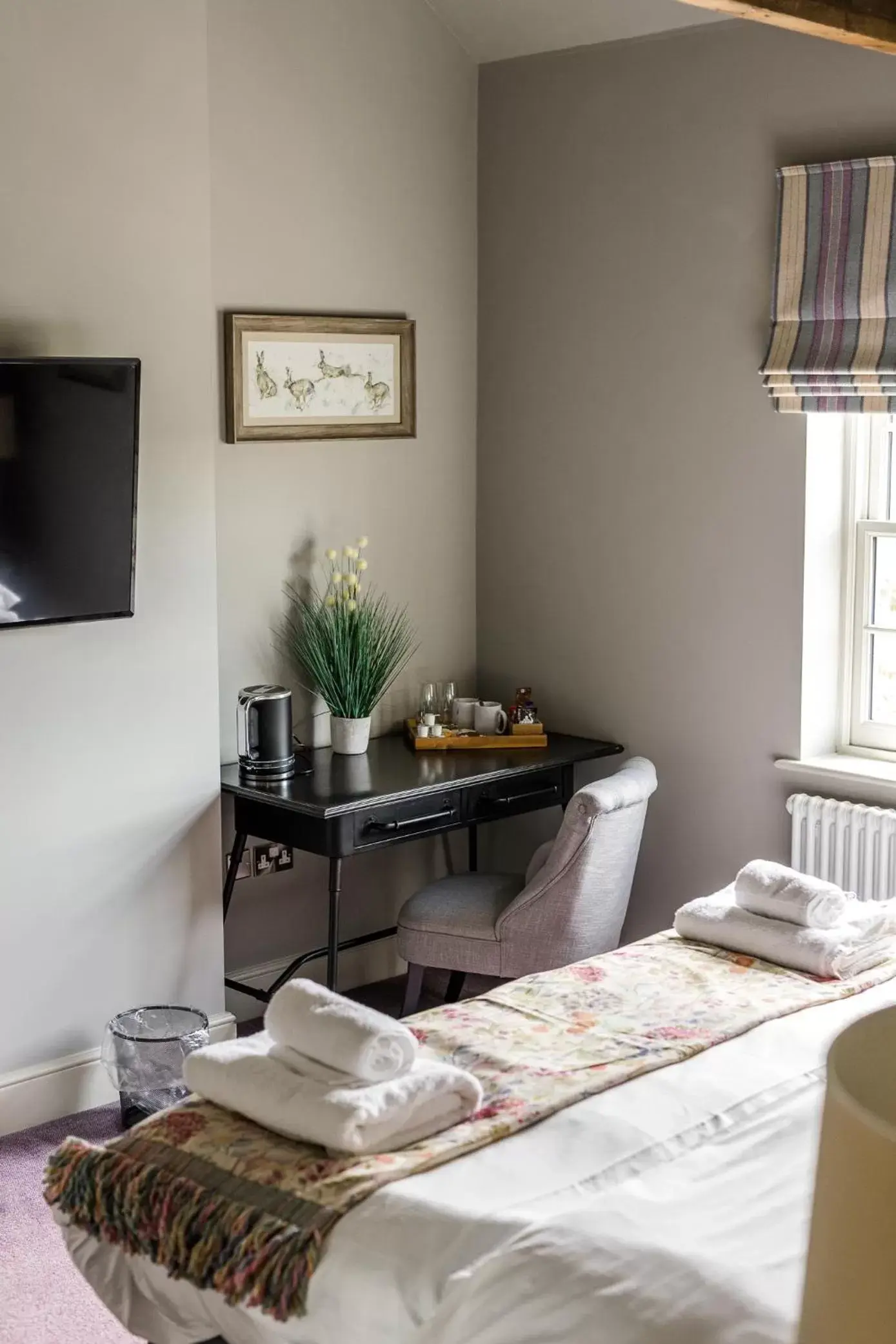 Decorative detail, TV/Entertainment Center in Plum and Partridge Husthwaite